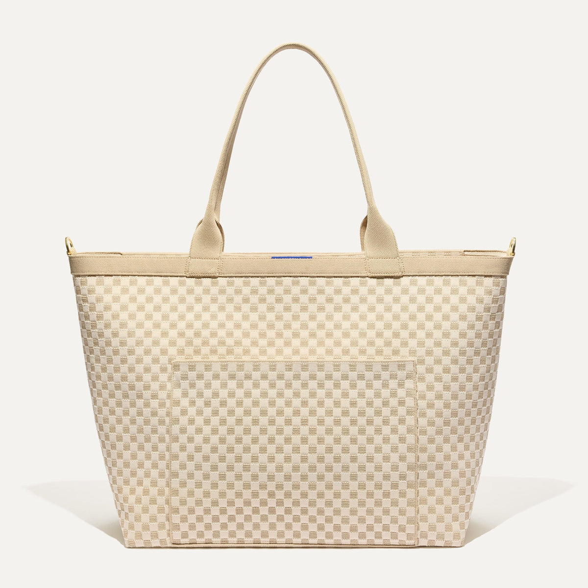 PDP |The Zip Travel Tote in  Parchment Basketweave shown from the front.