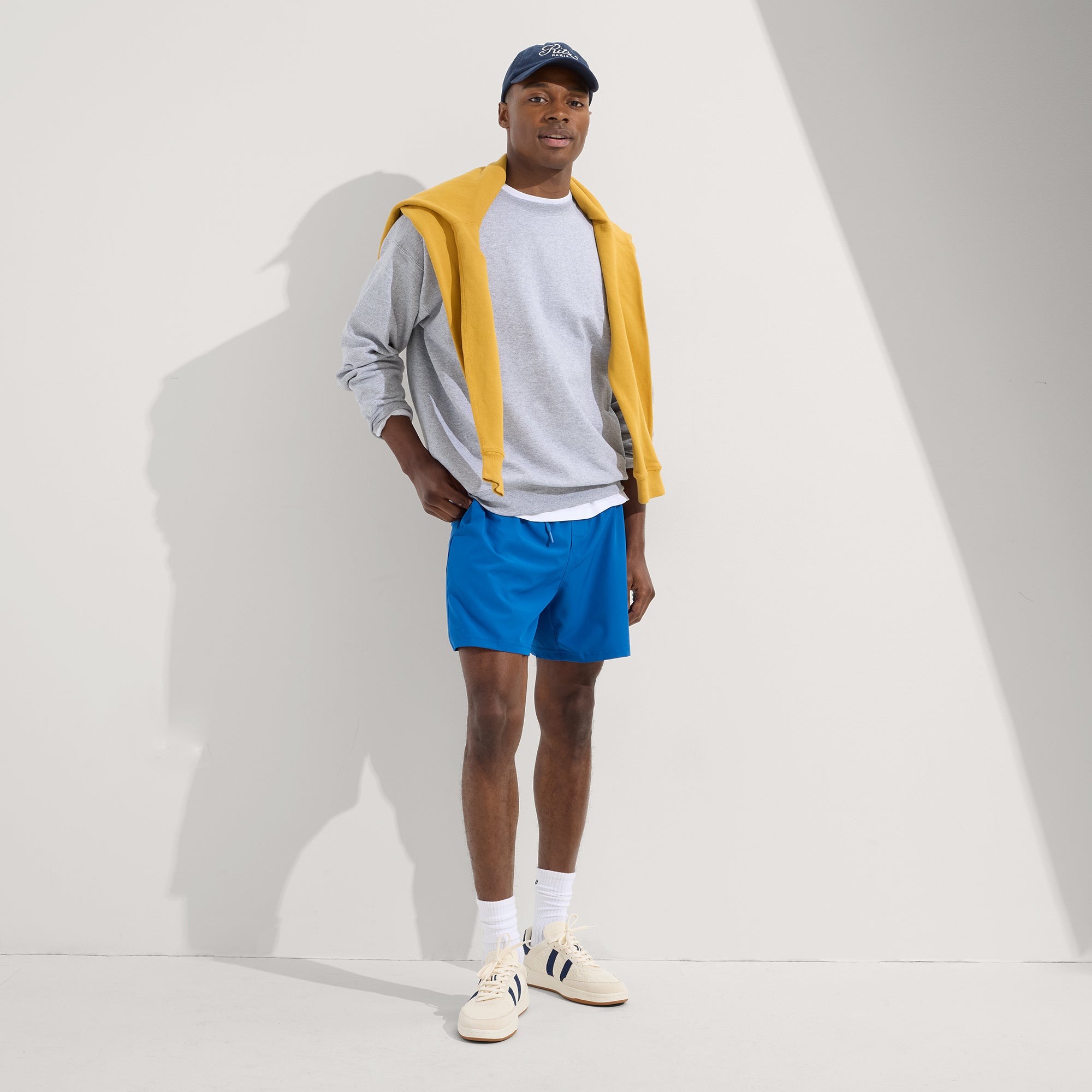 Alternate view of a model wearing The Men's Court Sneaker in Freestyle.