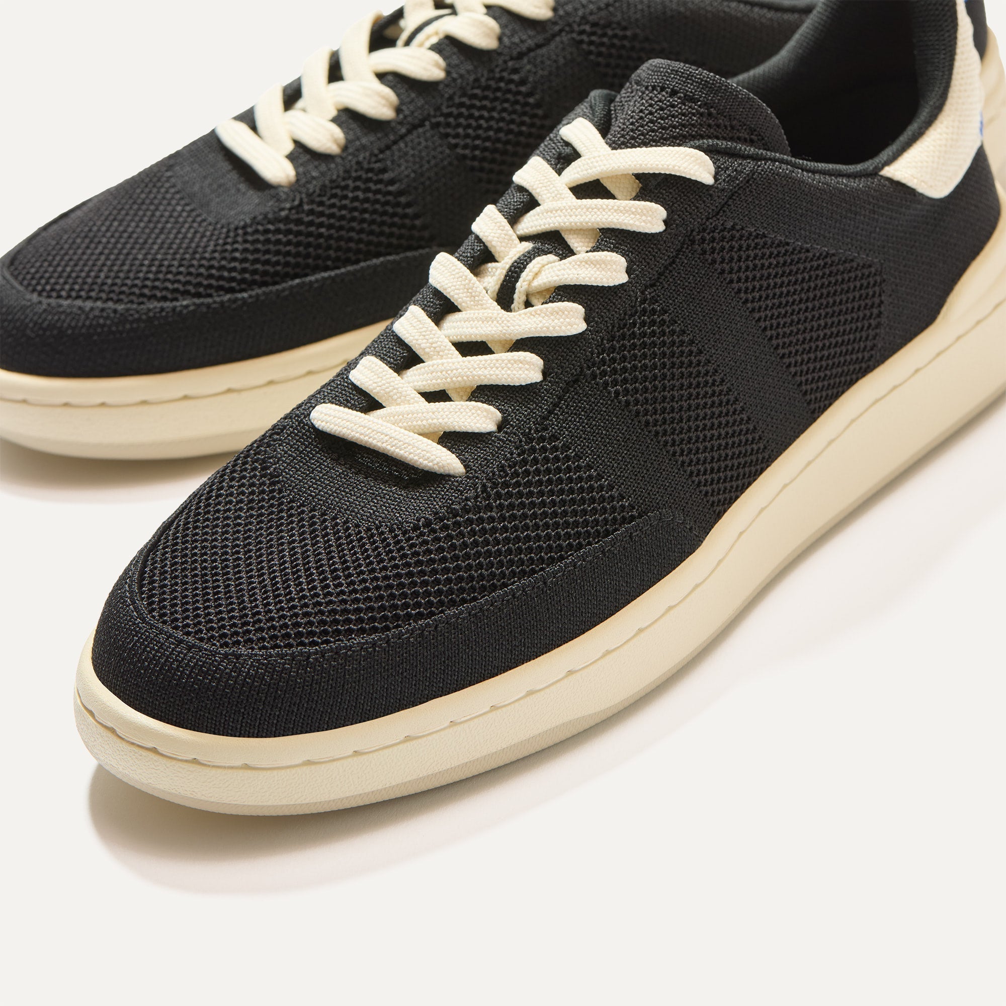 Close up of the toe and stitching details of The Men's Court Sneaker in Referee.