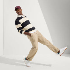 Alternate view of a model wearing The Men's Court Sneaker in Turf.