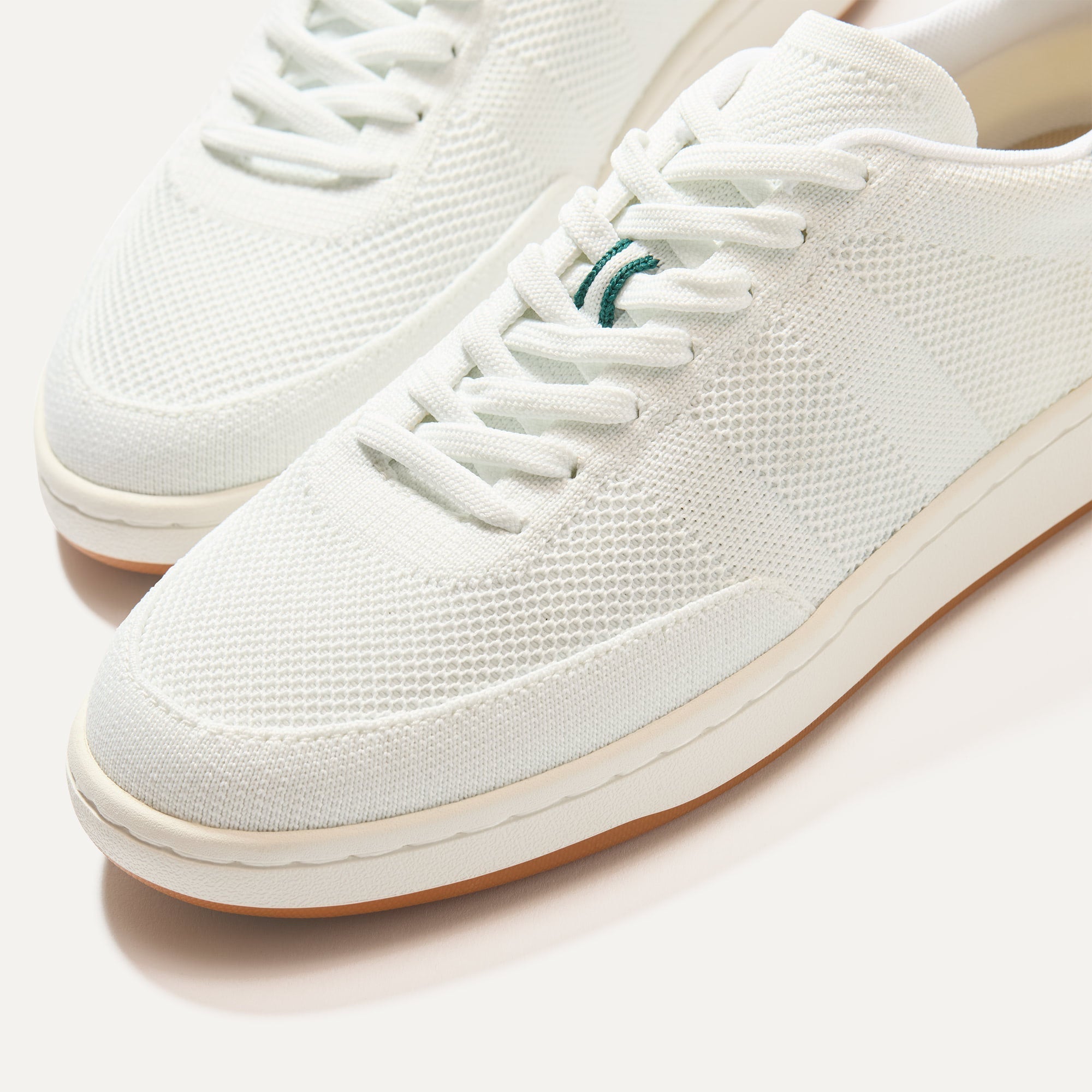 Close up of the toe and stitching details of The Men's Court Sneaker in Turf.