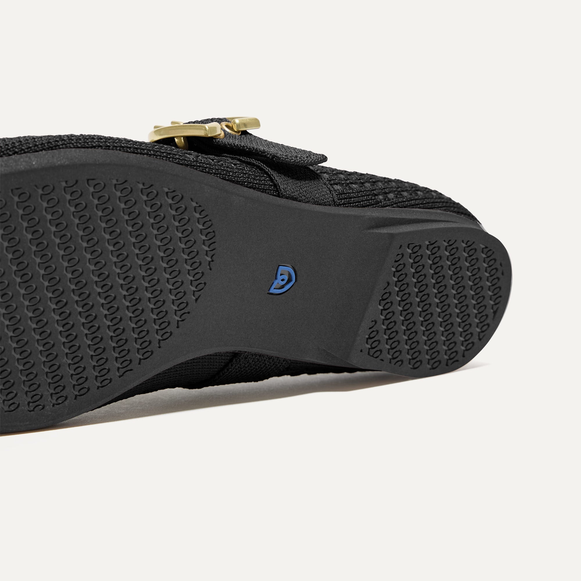 The sole of The Max Buckle Mary Jane in Black Mesh.