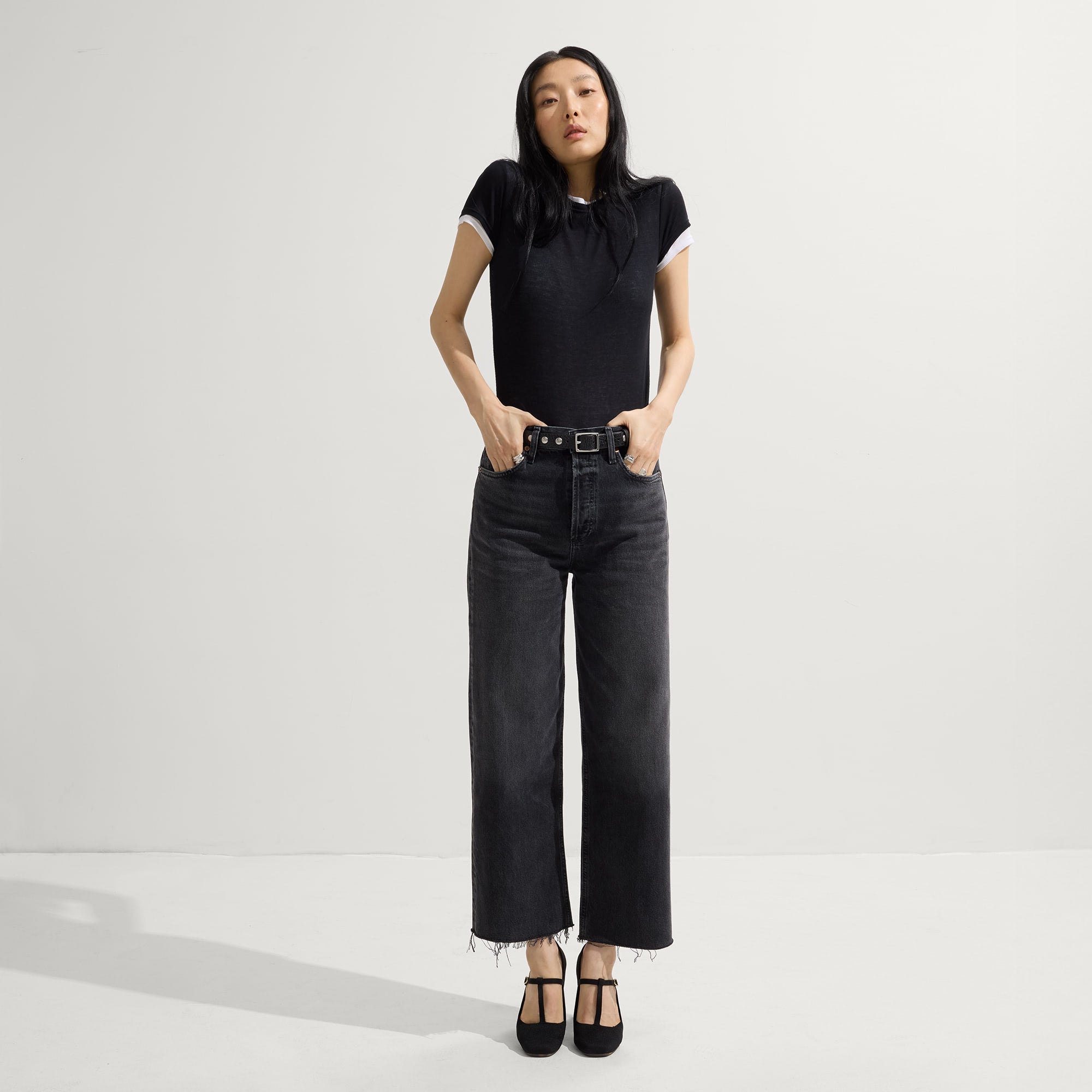 Alternate view of a model wearing The T-Strap Mary Jane in Black.