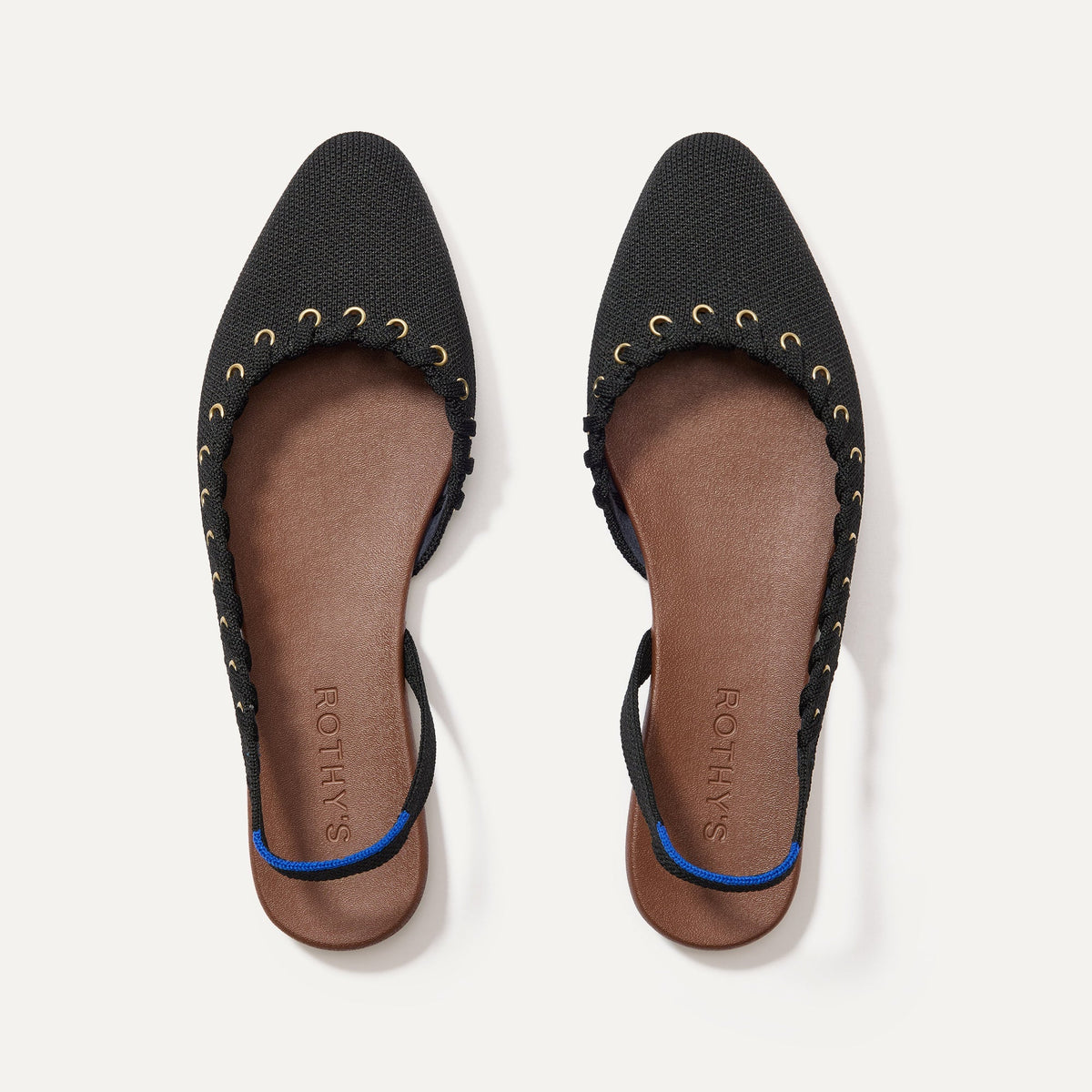 The Almond Slingback in Eyelet Black shown from the top.