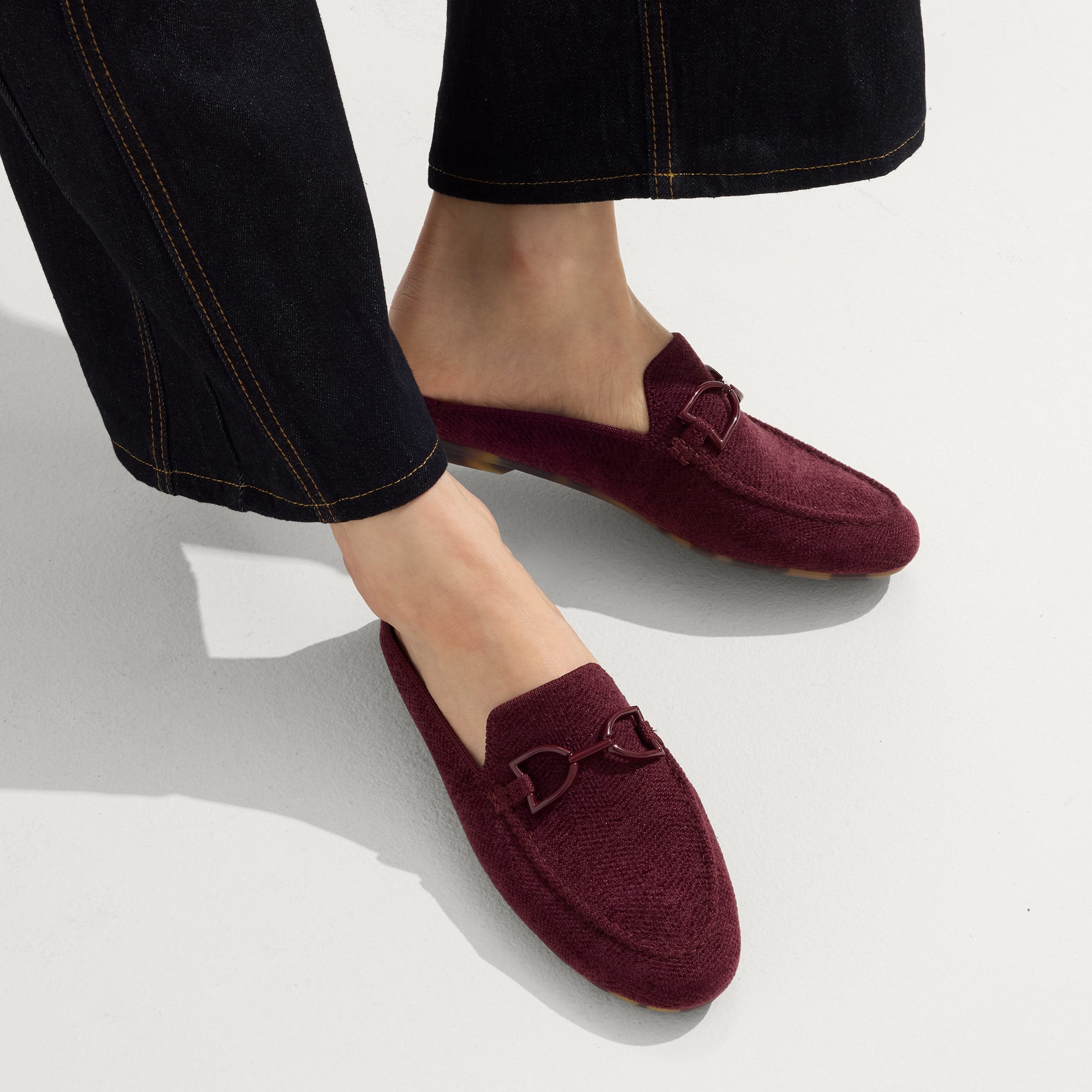 hover | Model wearing The Double Bit Loafer Mule in ReVelvet™ Syrah.