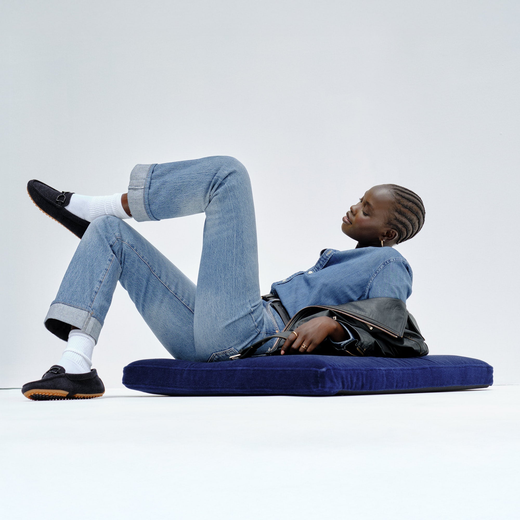 Alternate view of a model wearing The Double Bit Driver in ReVelvet™ Black.