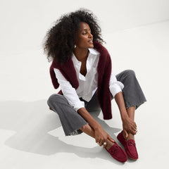 Alternate view of a model wearing The Double Bit Driver in ReVelvet™ Cabernet.