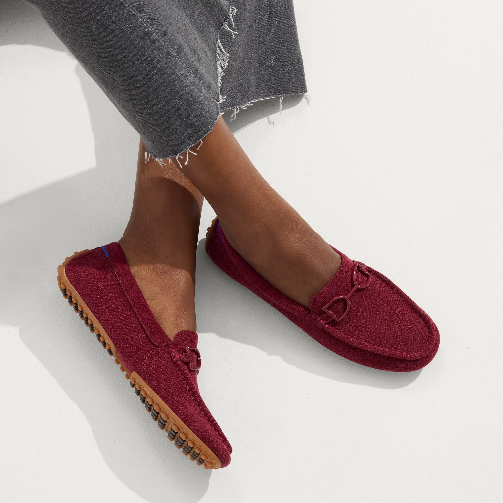 hover | Model wearing The Double Bit Driver in ReVelvet™ Cabernet.