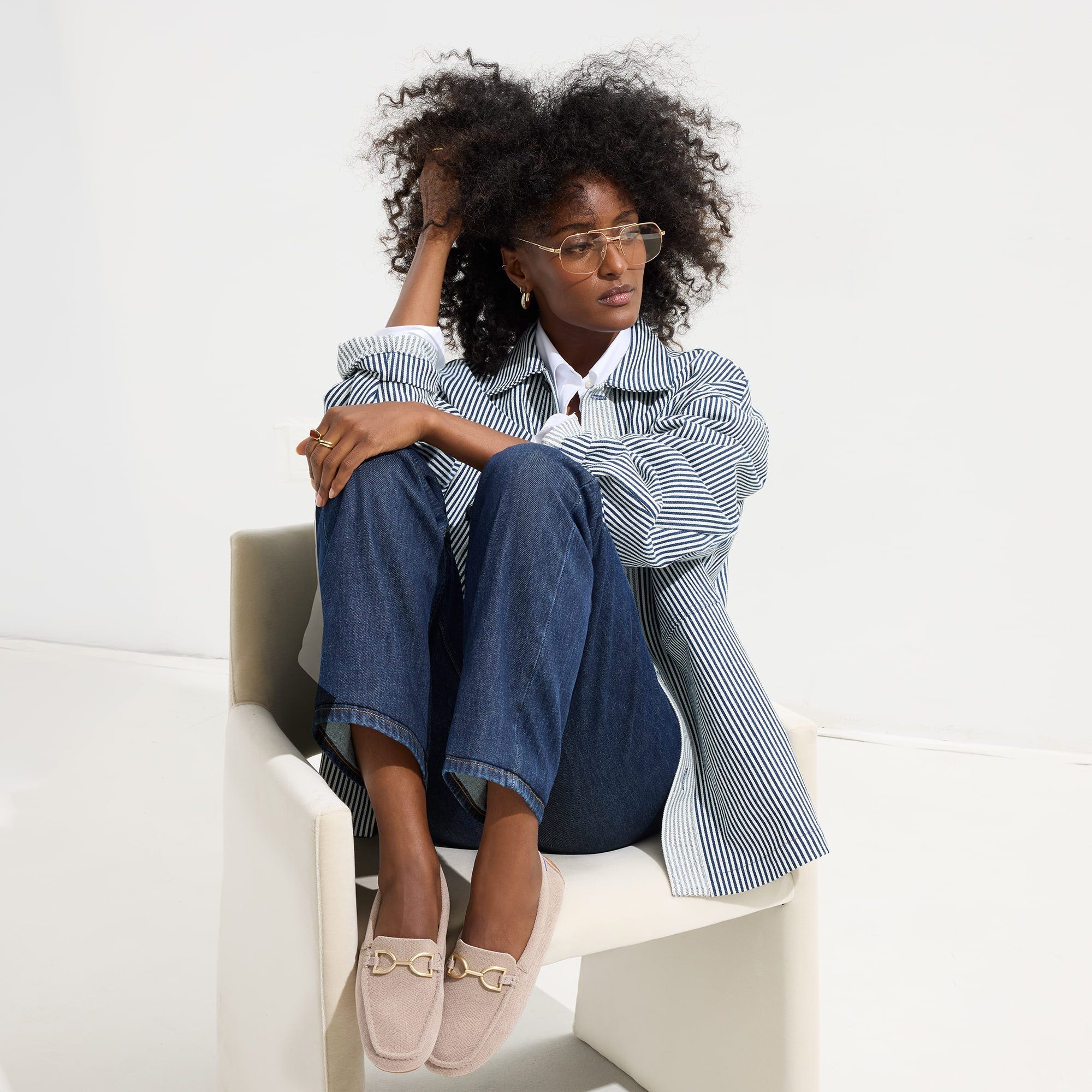 Alternate view of a model wearing The Double Bit Driver in ReVelvet™ Dove.