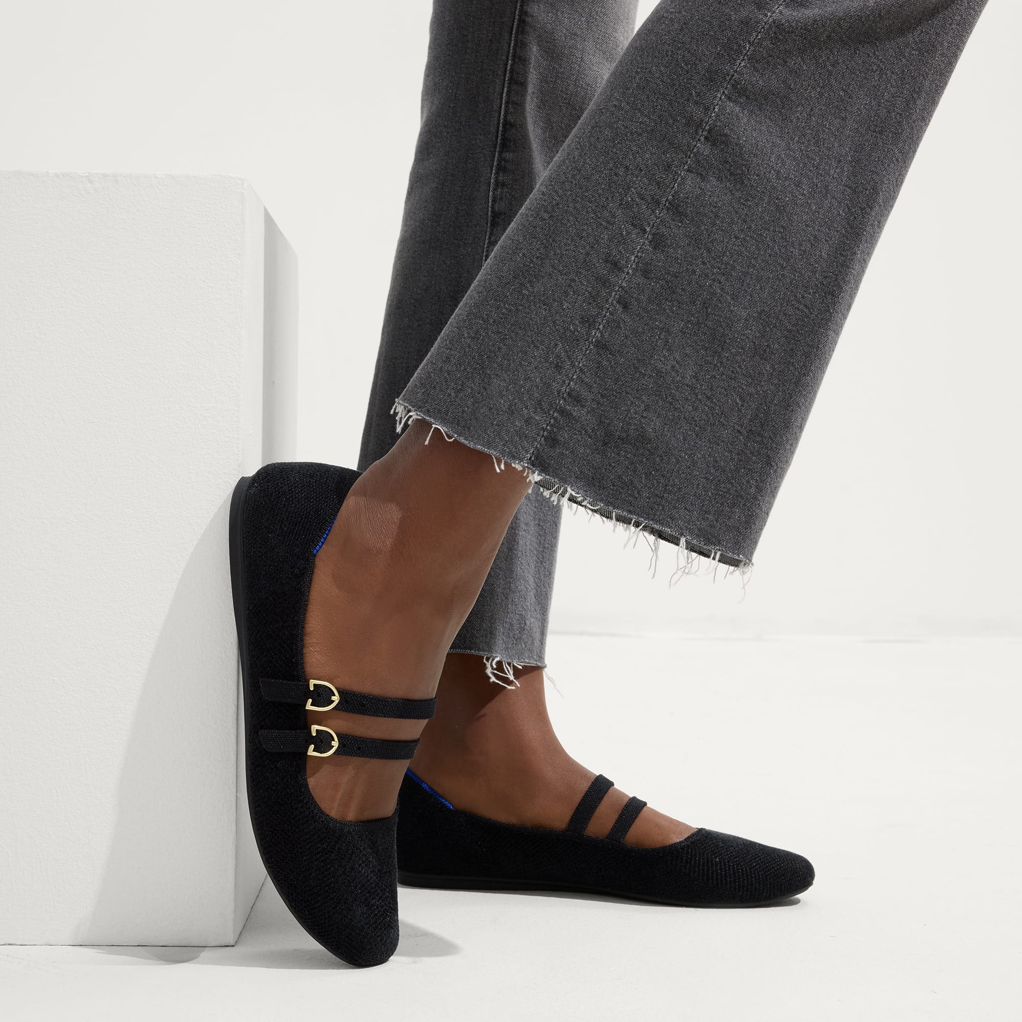 hover | Model wearing The Double Buckle Mary Jane in ReVelvet™ Black.