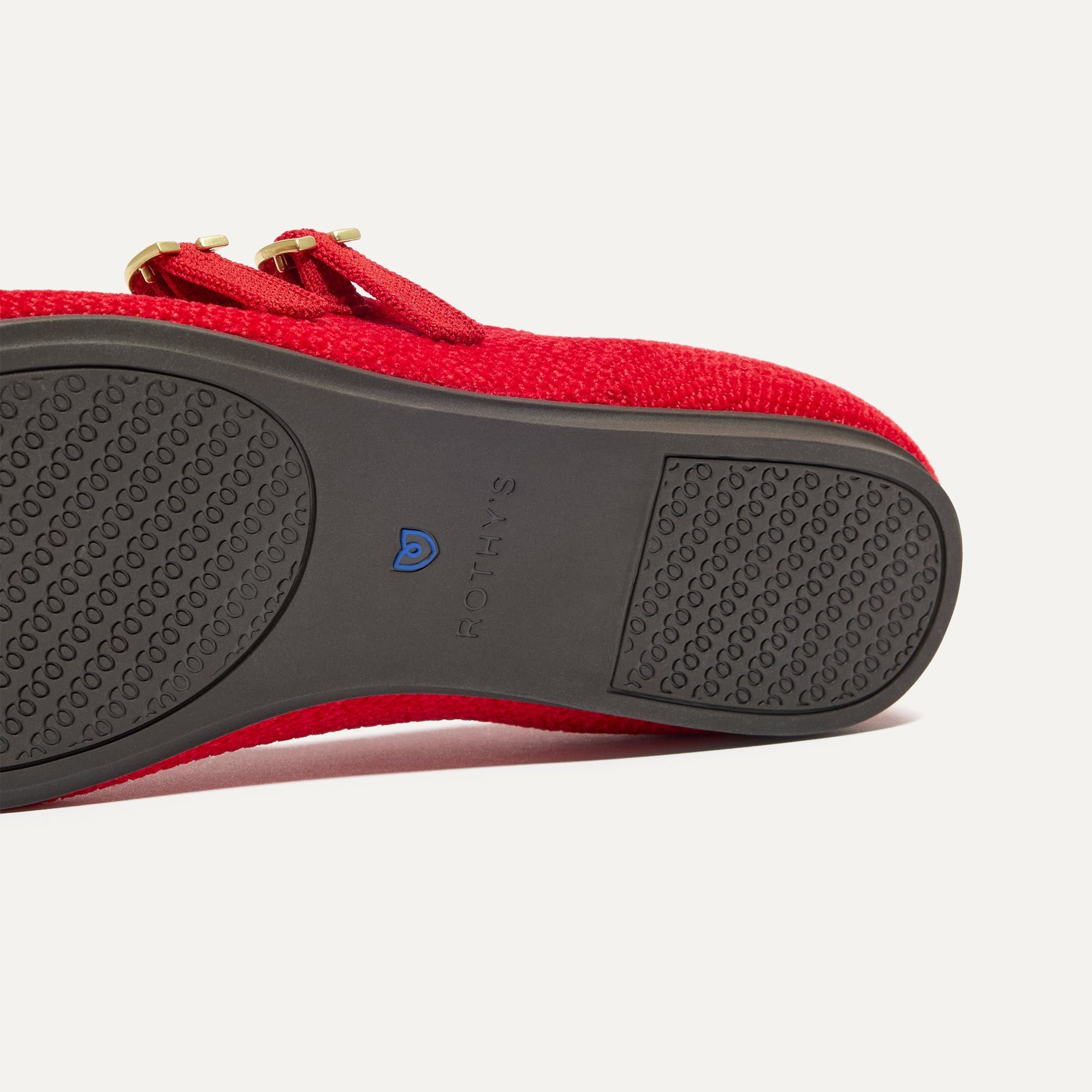 The sole of The Double Buckle Mary Jane in ReVelvet™ Red Crisp.