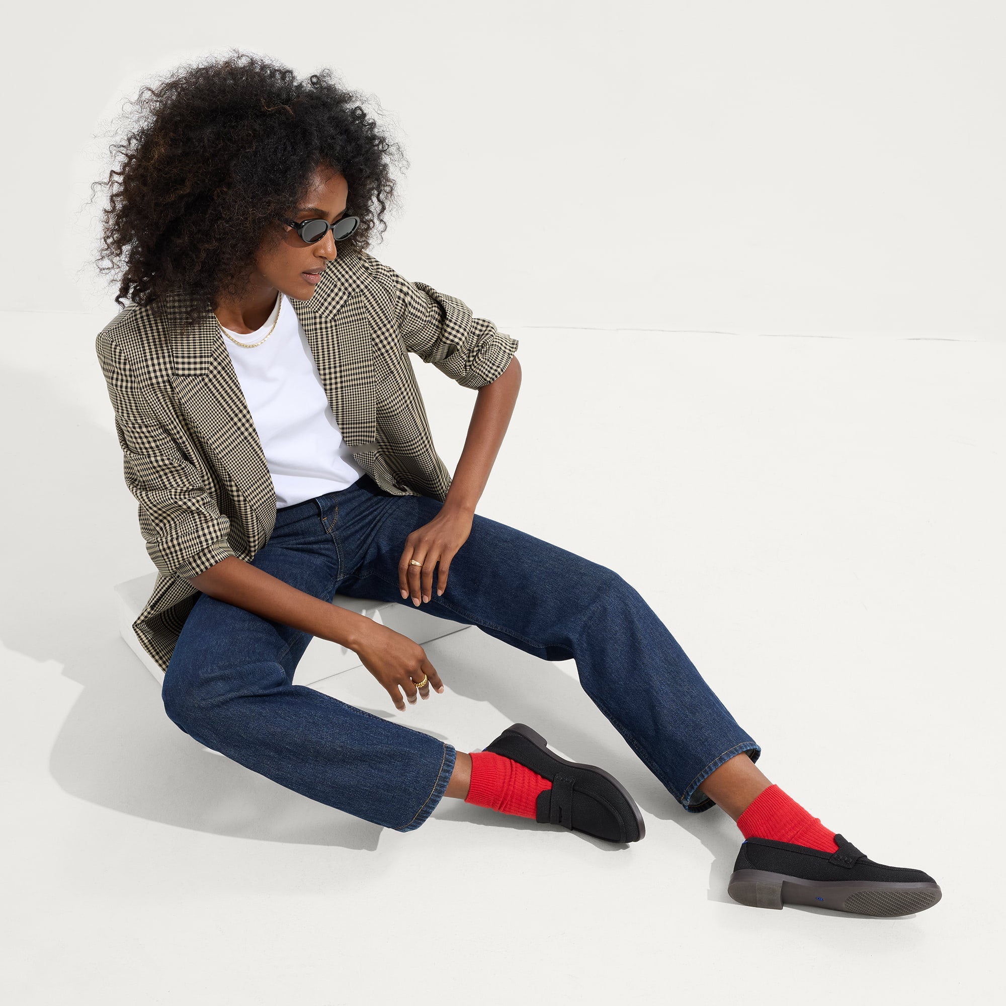 Model wearing The Penny Loafer in Black.