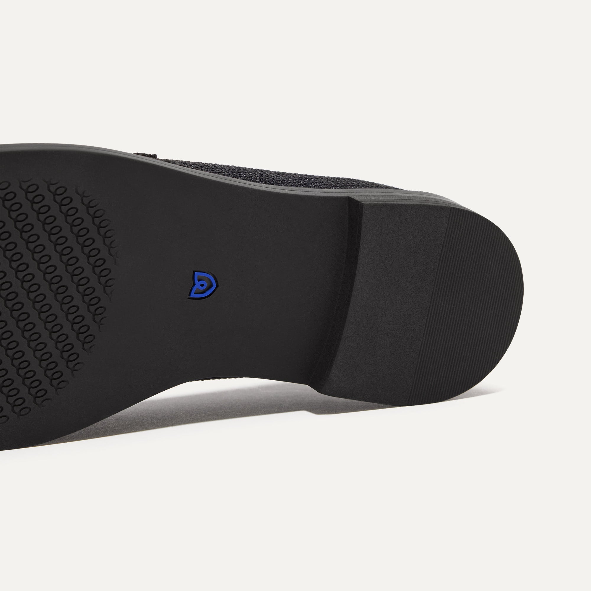 The Penny Loafer in Black shown in diagonal view.