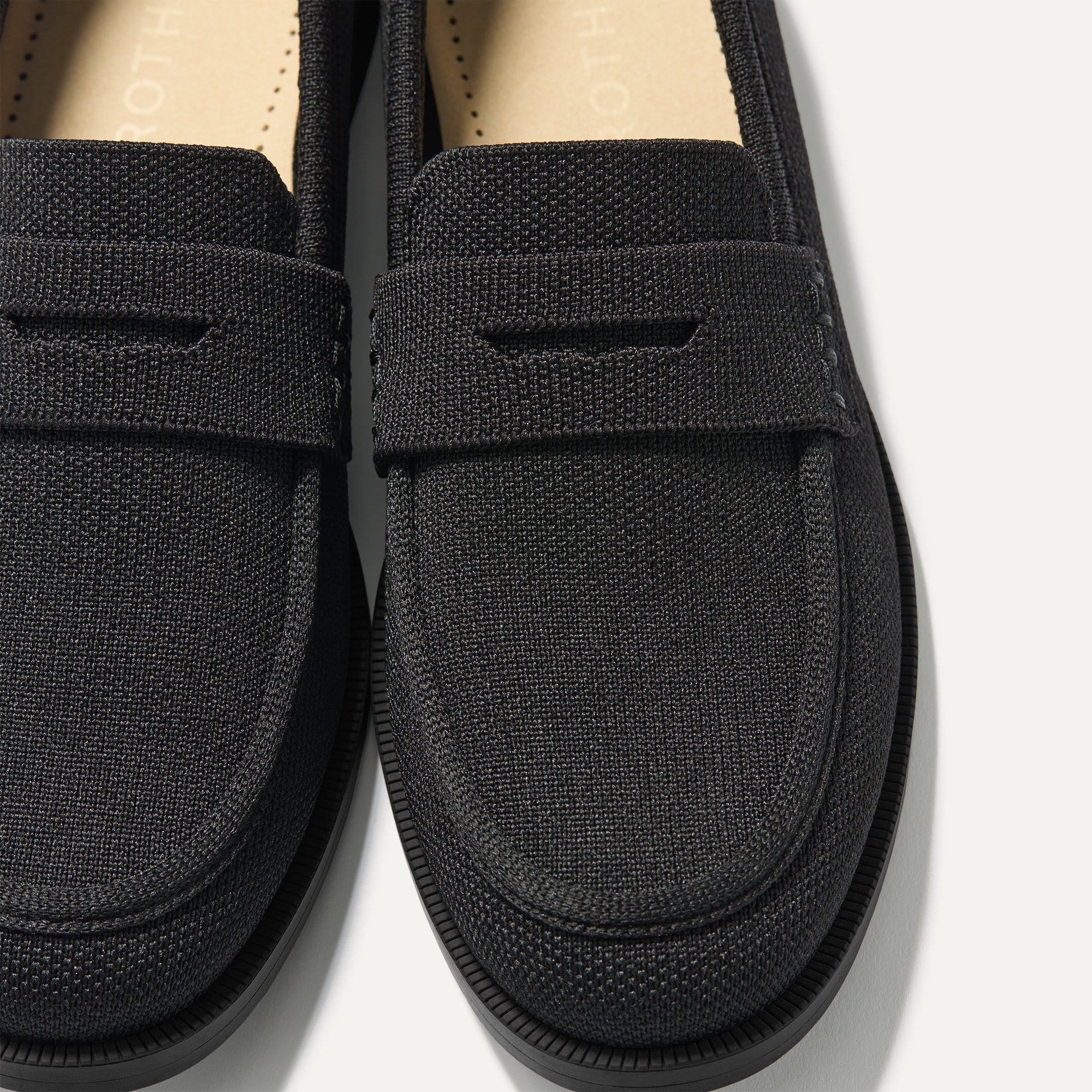 Close up of the toe and vamp of The Penny Loafer in Black.
