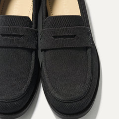 Close up of the toe and vamp of The Penny Loafer in Black.