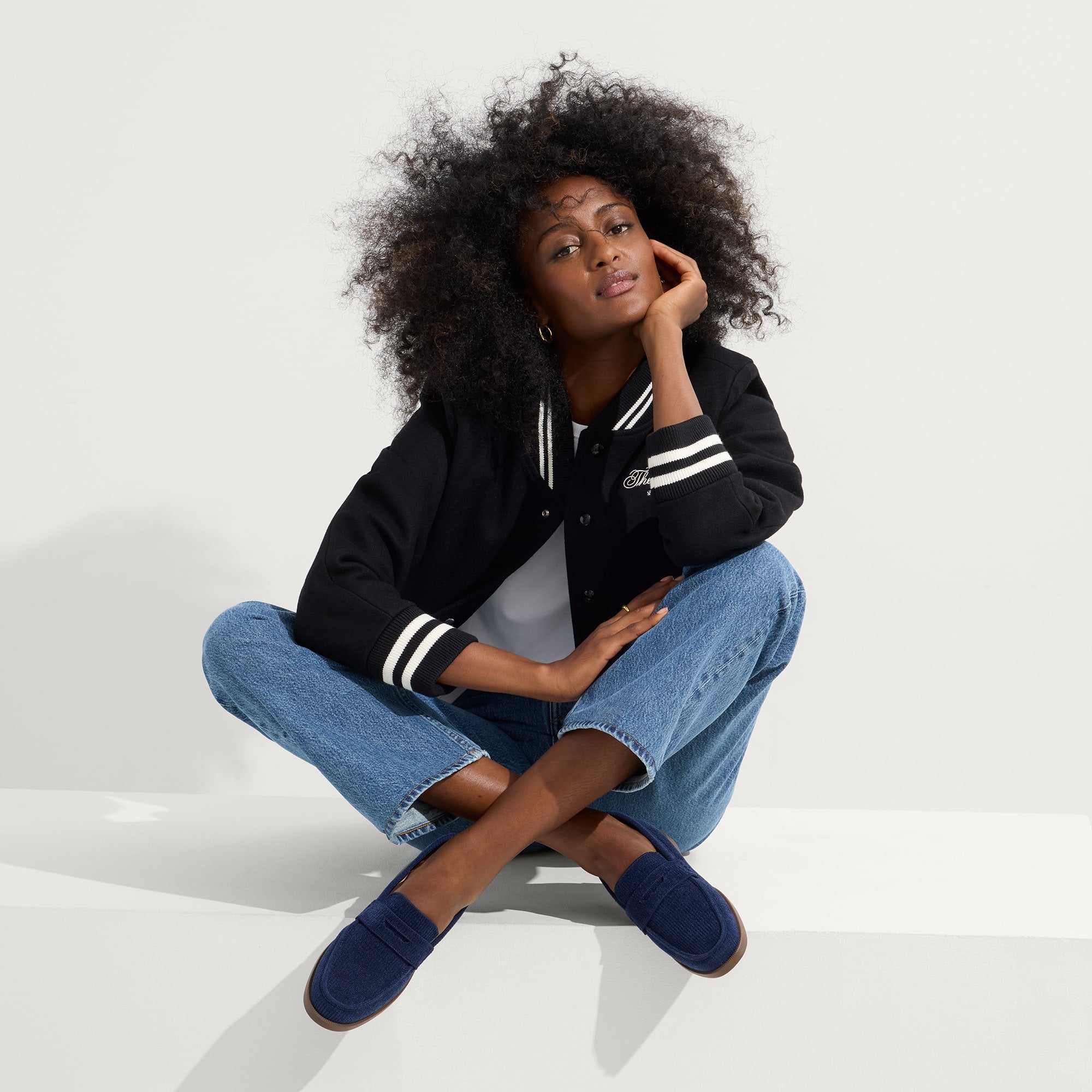 Alternate view of a model wearing The Penny Loafer in ReVelvet™ Navy.