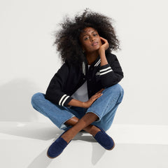 Alternate view of a model wearing The Penny Loafer in ReVelvet™ Navy.