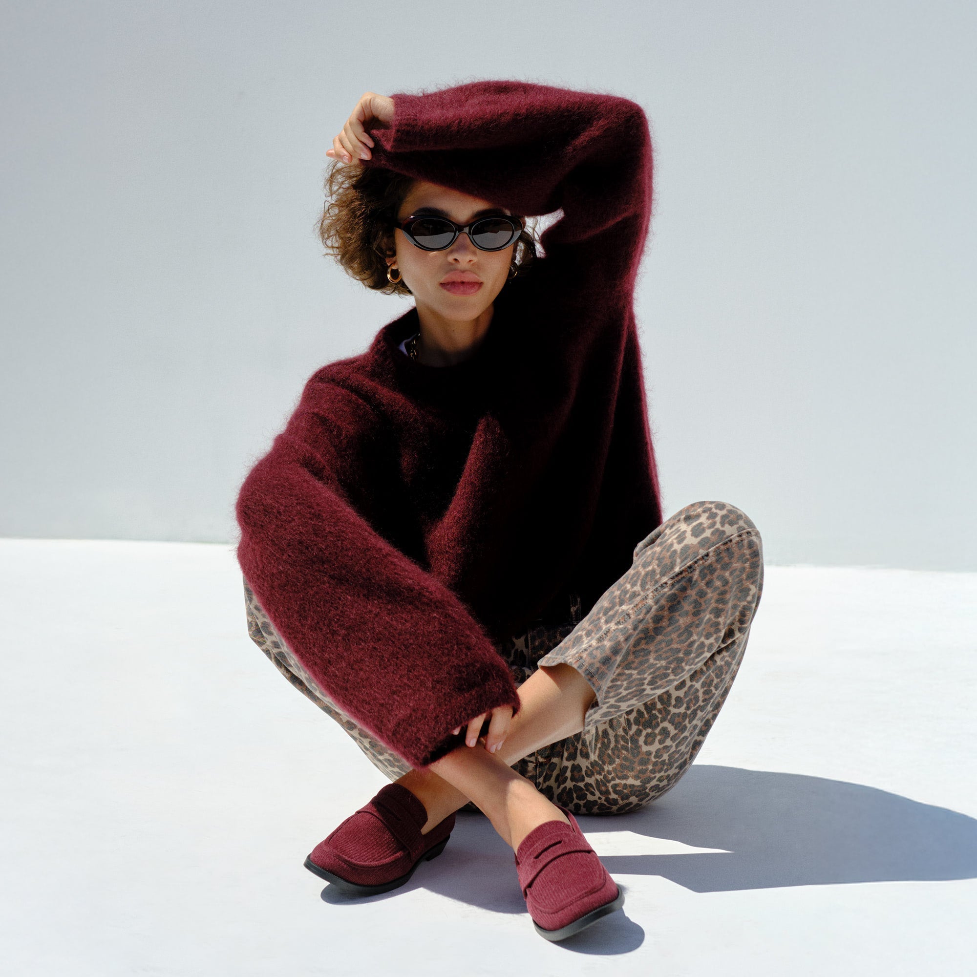 Alternate view of a model wearing The Penny Loafer in ReVelvet™ Syrah.