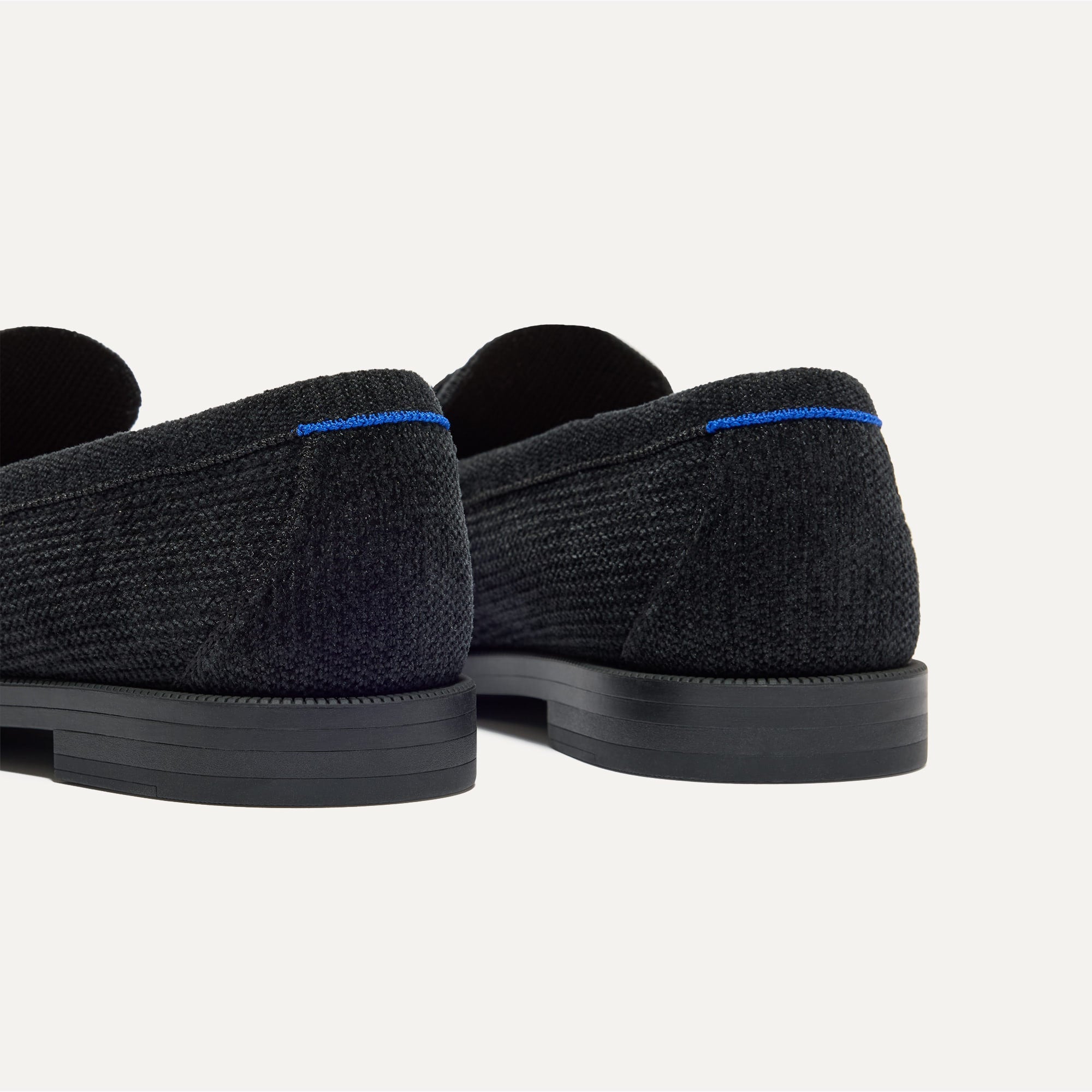 Close up of the heel of The Penny Loafer in ReVelvet™ Black.