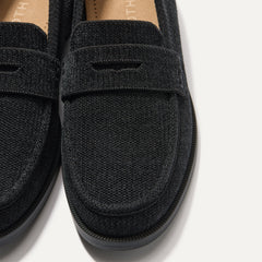 Close up of the toe box and penny keeper of The Penny Loafer in ReVelvet™ Black.