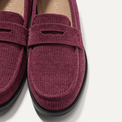Close up of the toe box and penny keeper of The Penny Loafer in ReVelvet™ Syrah.