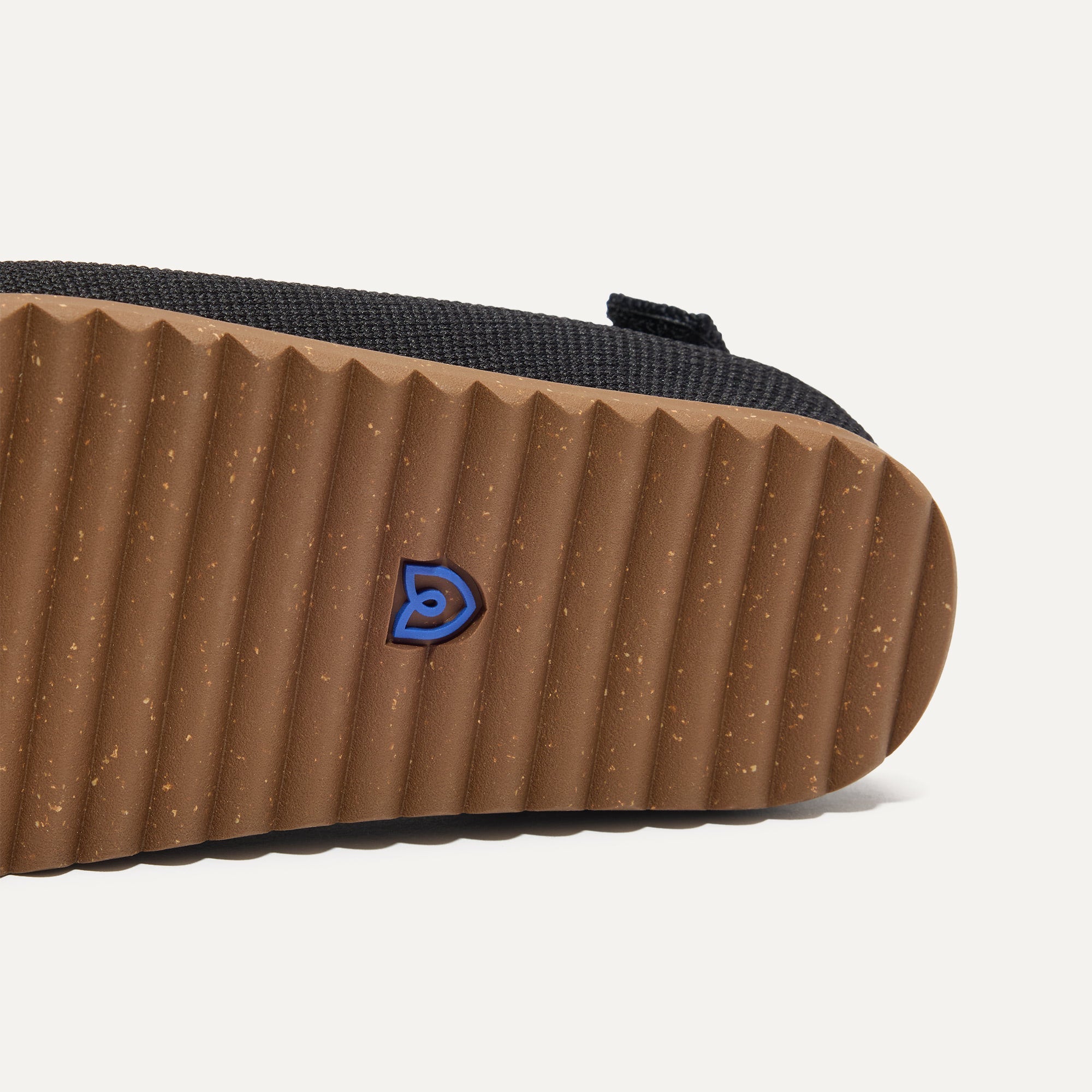 The sole of The Kids Clog in Black.