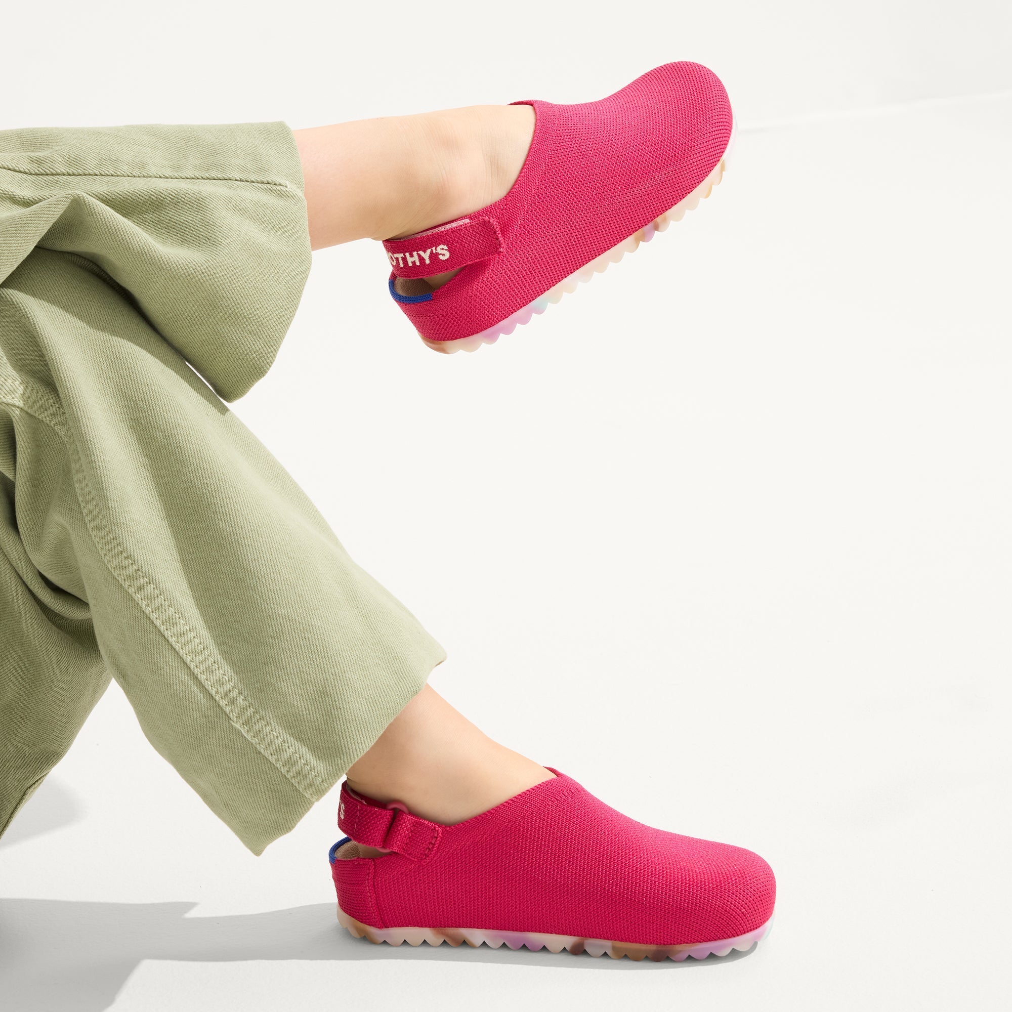 hover | A child wearing The Kids Clog in Confetti Cake.