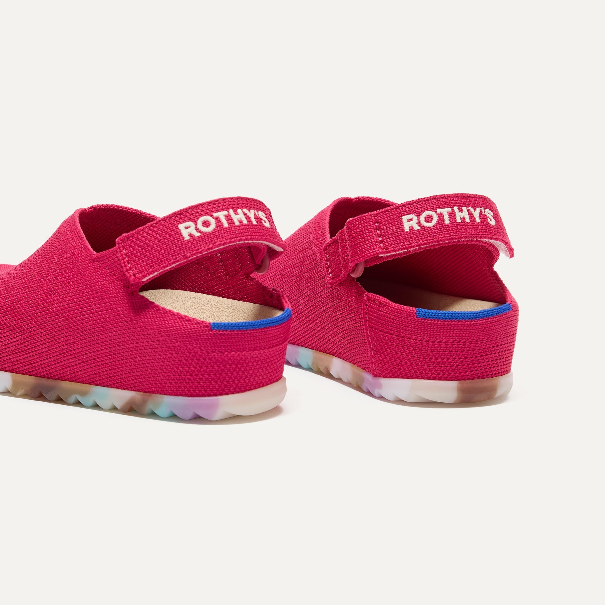 Close up of the heel of The Kids Clog in Confetti Cake, with Rothy's signature blue halo. 