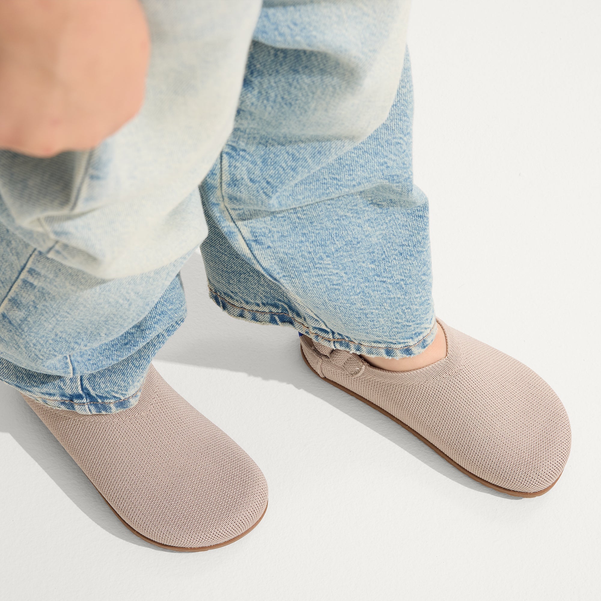 hover | A child wearing The Kids Clog in Dove.