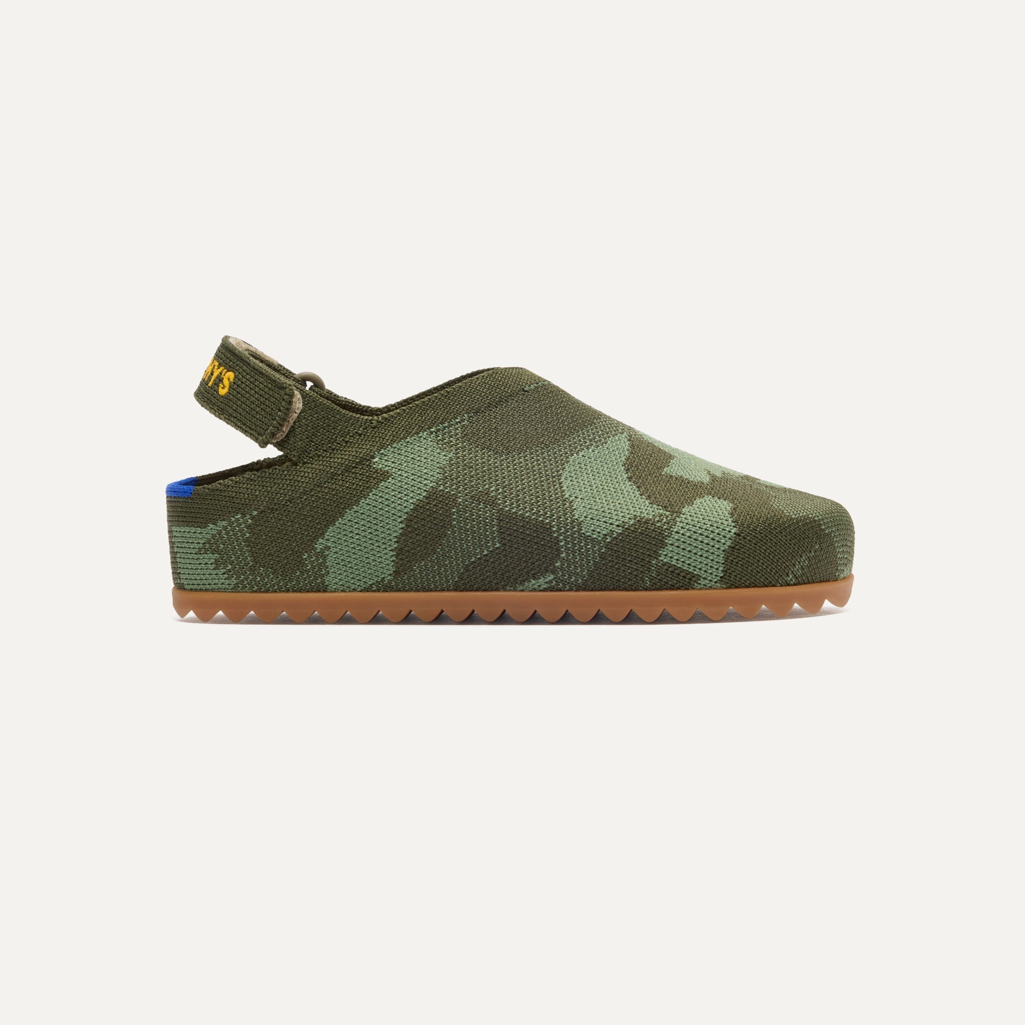 The Kids Clog in Green Camo shown from the side.