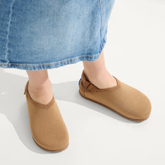 hover | A child wearing The Kids Clog in Java Chip.