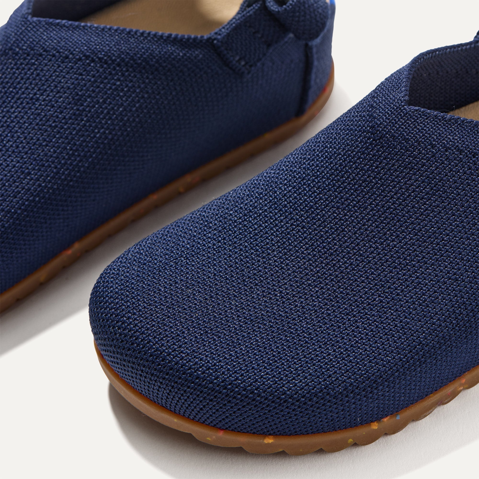 Close up of the vamp of The Kids Clog in Midnight Confetti.