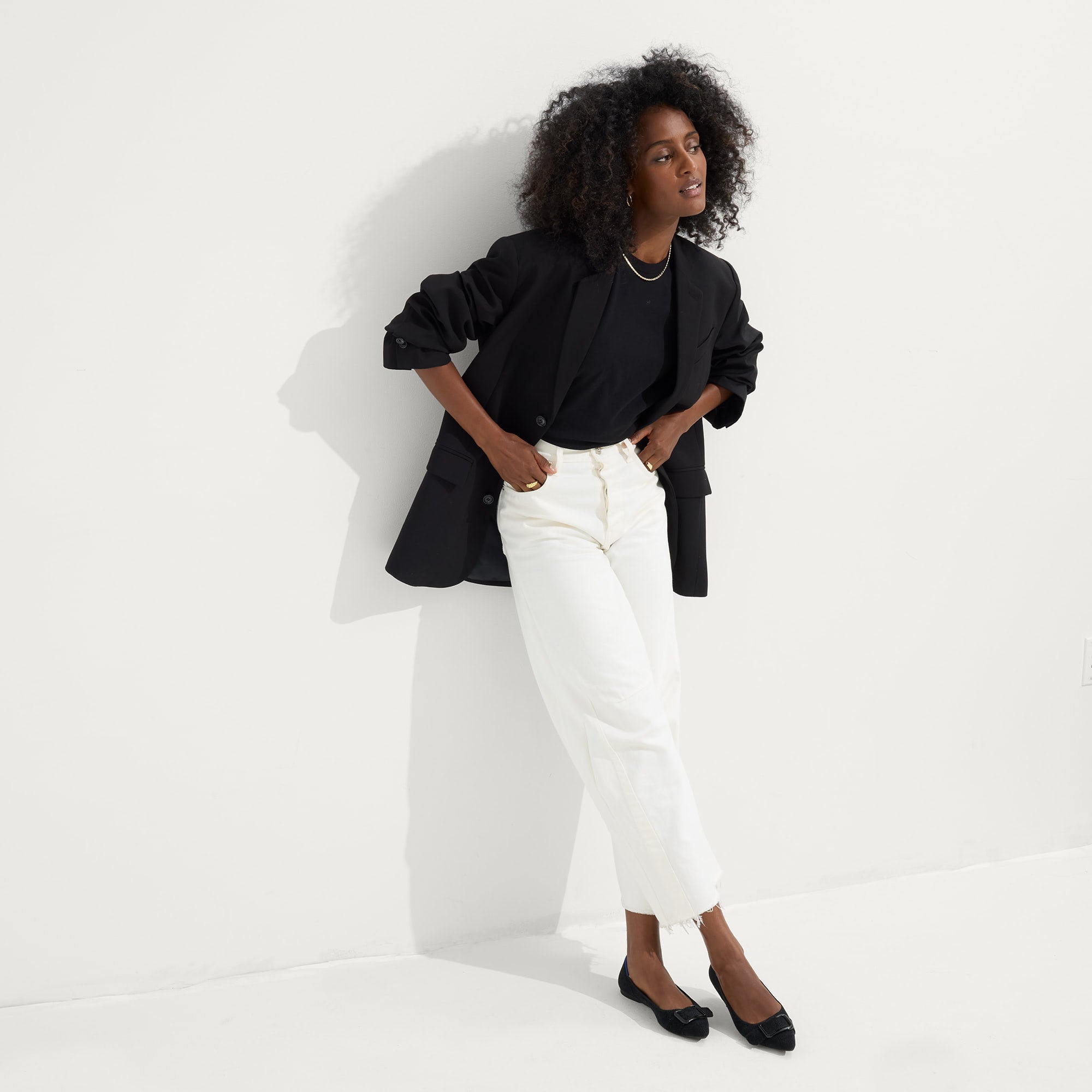 Alternate view of a model wearing The Emblem Point II in ReVelvet™ Black.