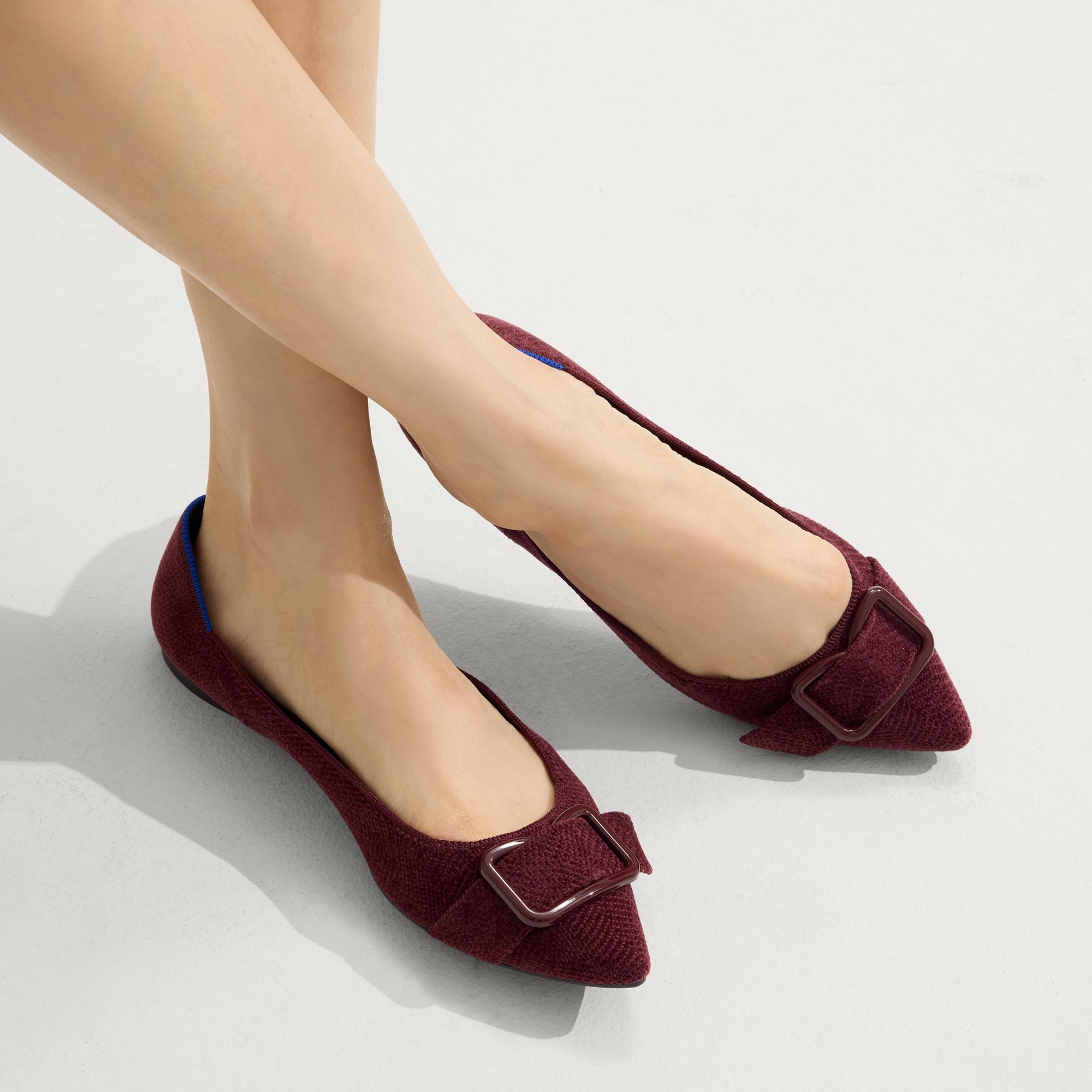 hover | Model wearing The Emblem Point II in ReVelvet™ Syrah.
