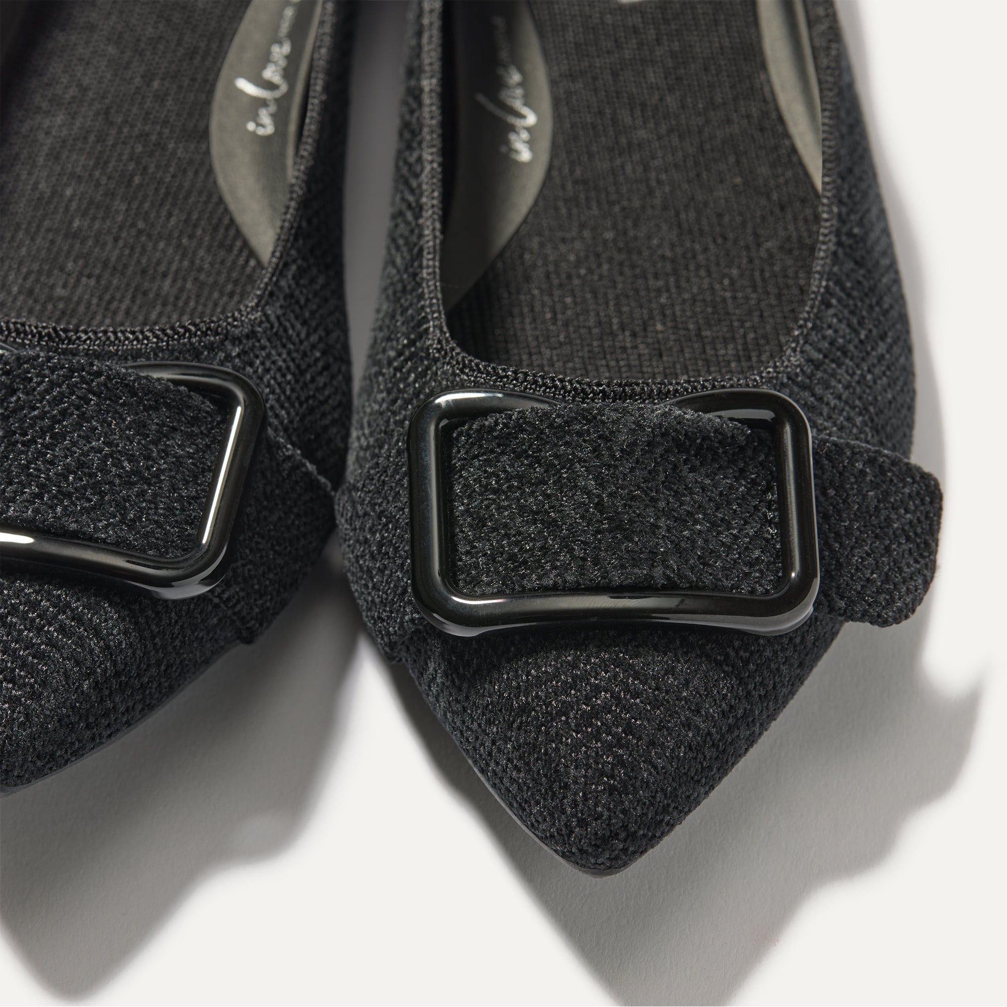 Close up of the hardware detail of The Emblem Point II in ReVelvet™ Black.