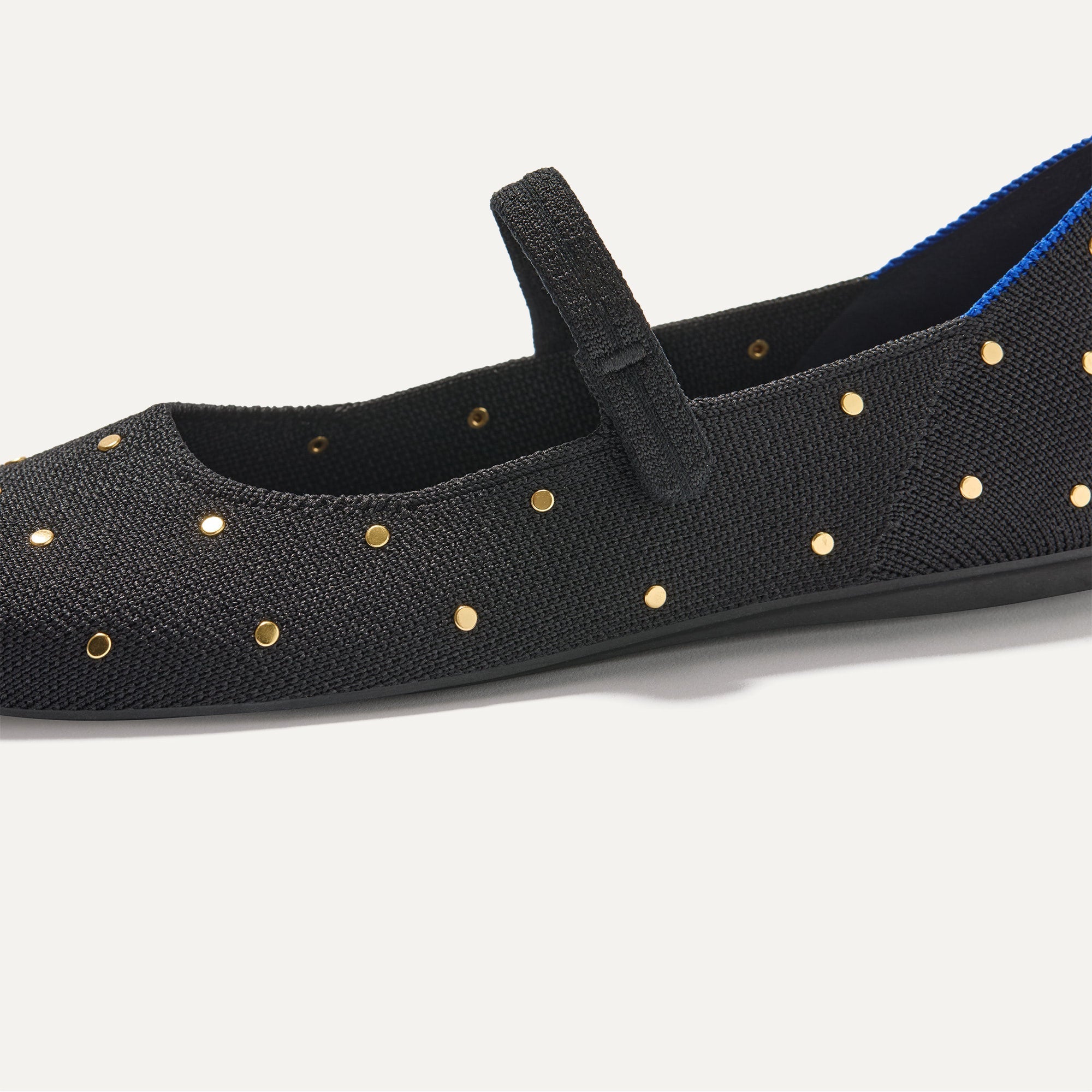 A close up of The Square Mary Jane in Studded Black shown from the side.