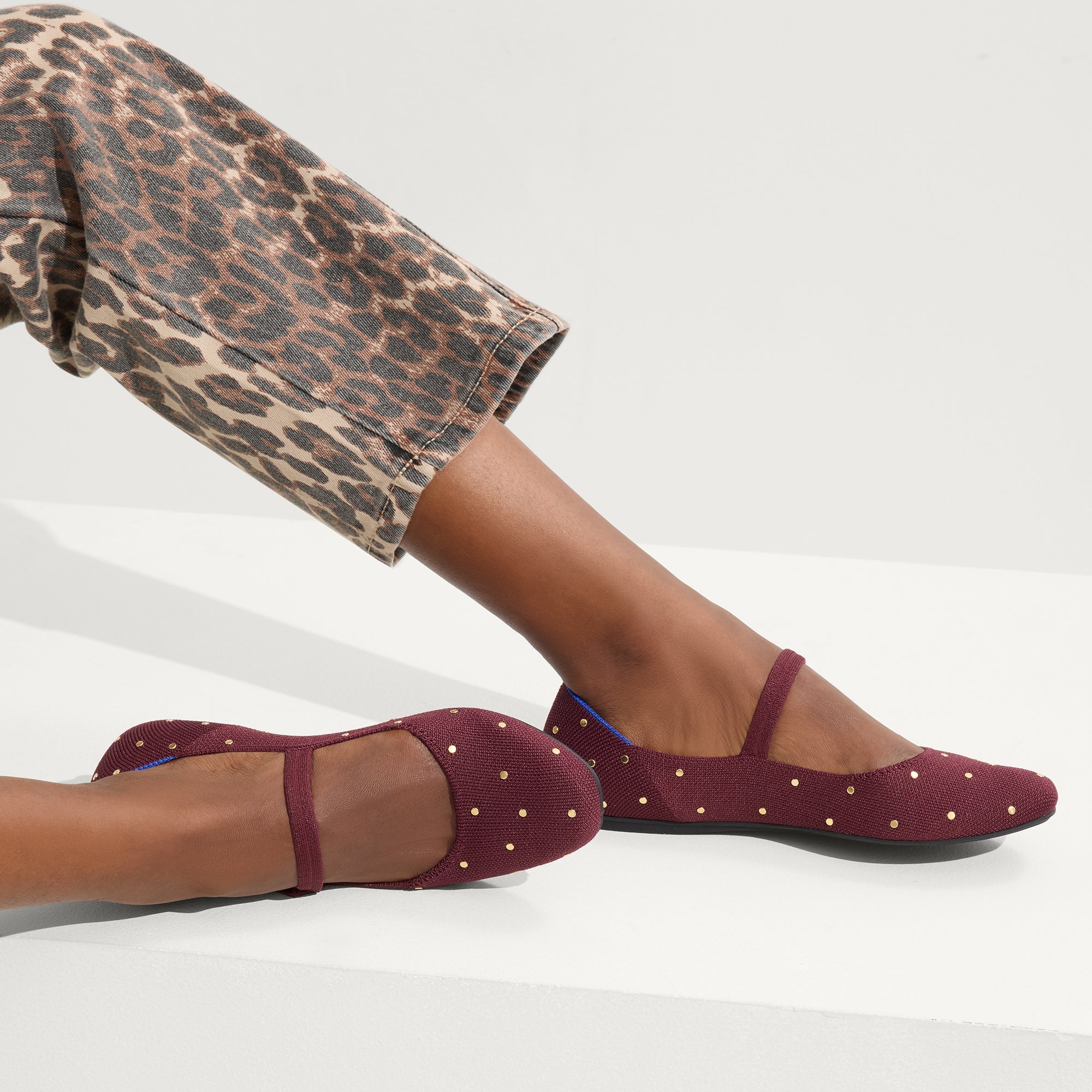 hover | Model wearing The Square Mary Jane in Studded Syrah.