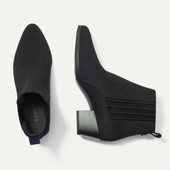 A pair of The Western Bootie in Black shown from the top.