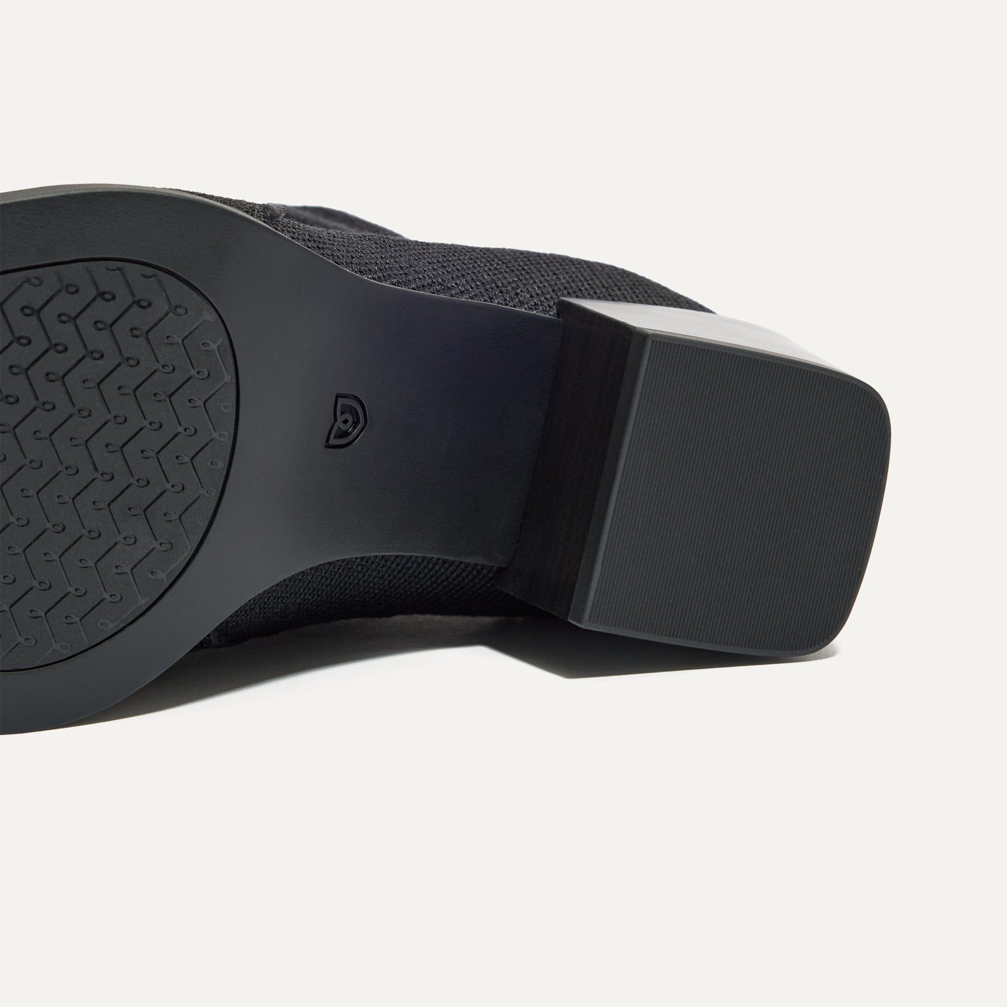 Close up of the outsoles of The Western Bootie in Black.