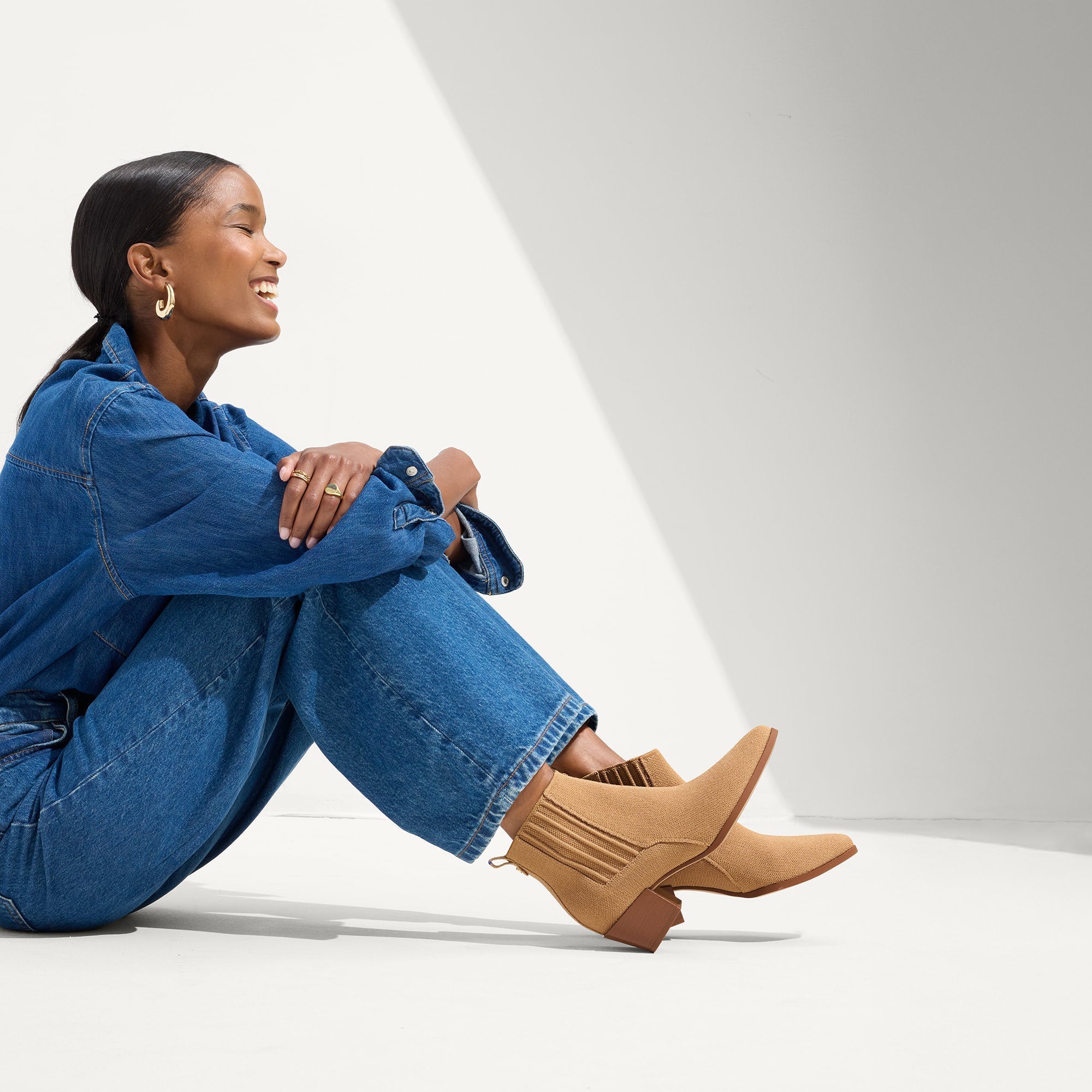 Alternate view of a model wearing The Western Bootie in Wren.