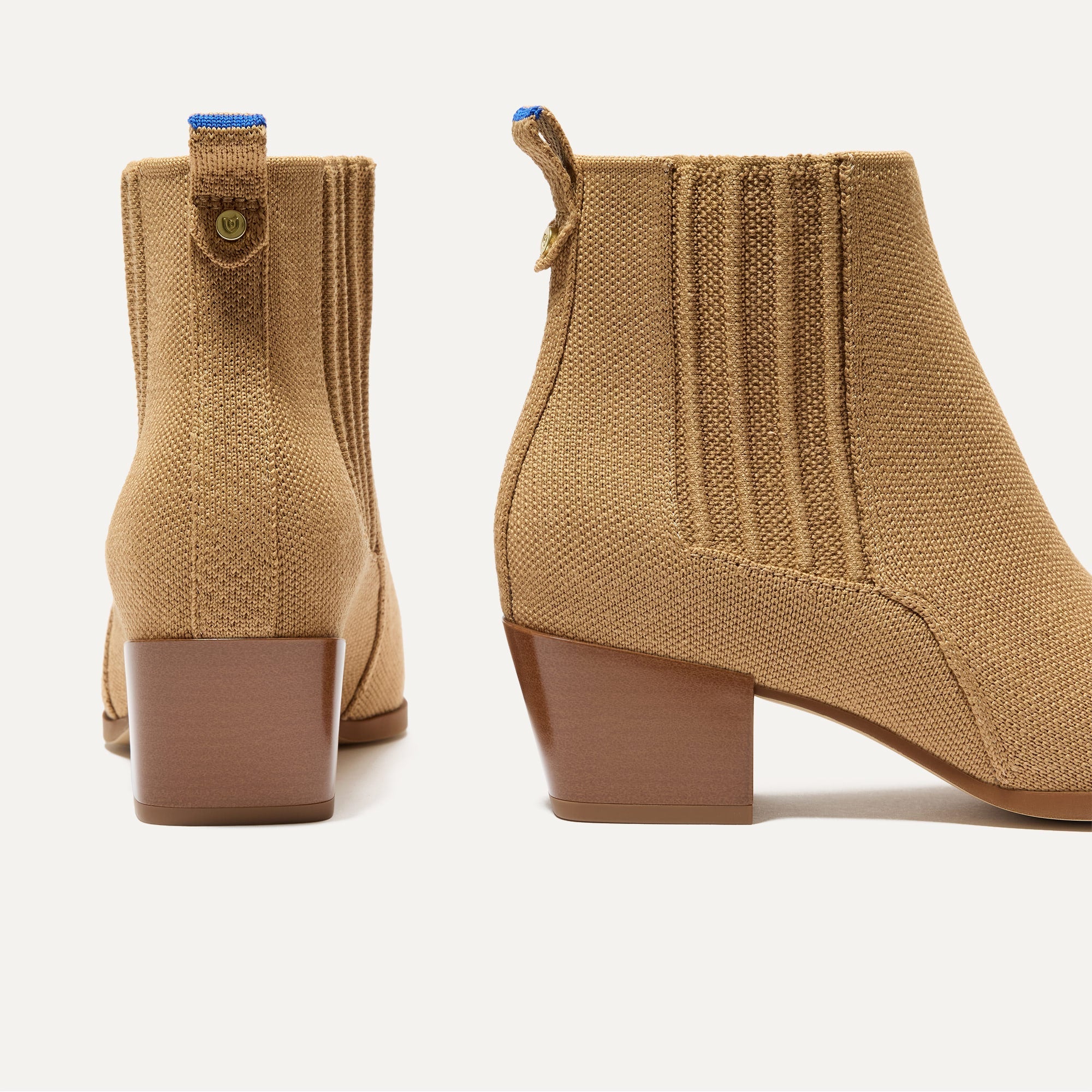 A pair of The Western Bootie in Wren shown from the back.
