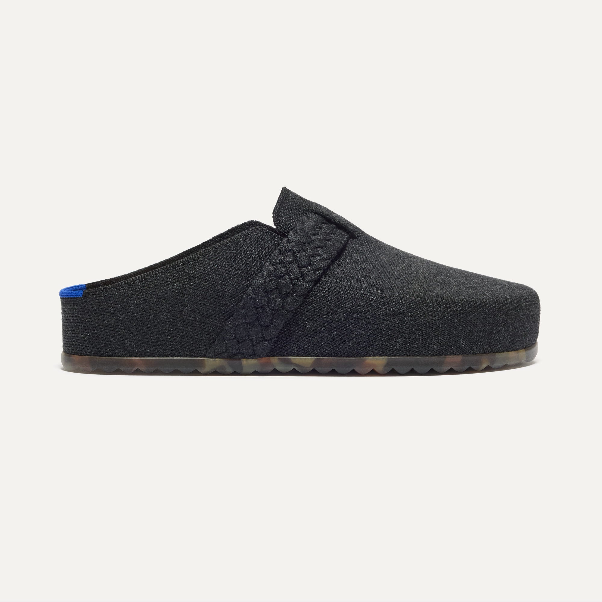 The Braid Clog in Black shown from the side.