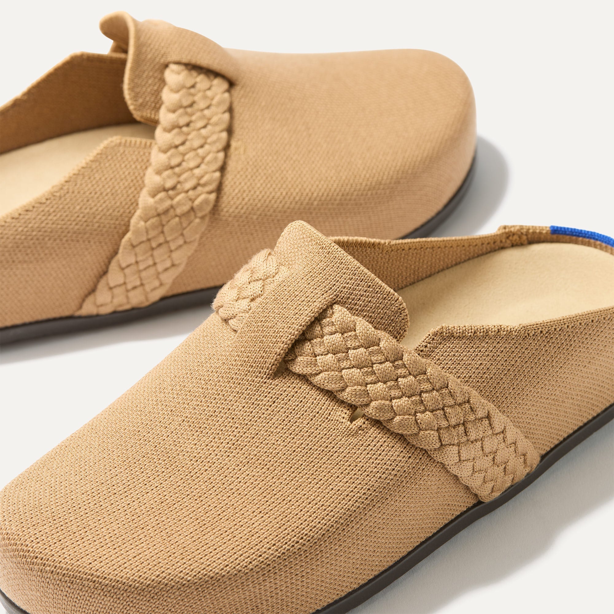 The toe and vamp of The Braid Clog, in diagonal view.