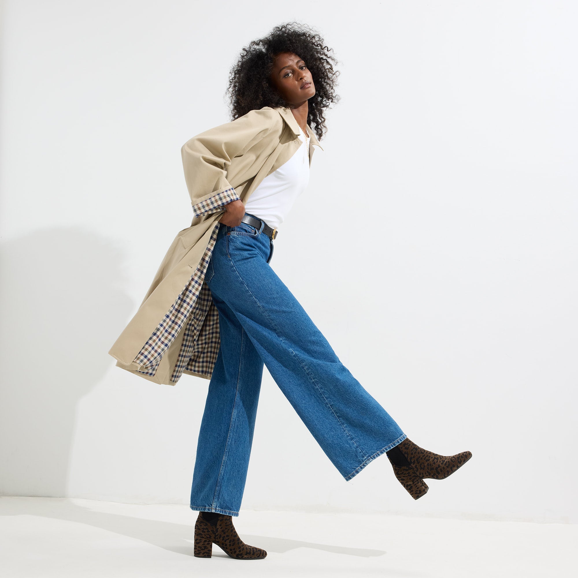 Alternate view of a model wearing The High Classic Boot in ReVelvet™ Cheetah.