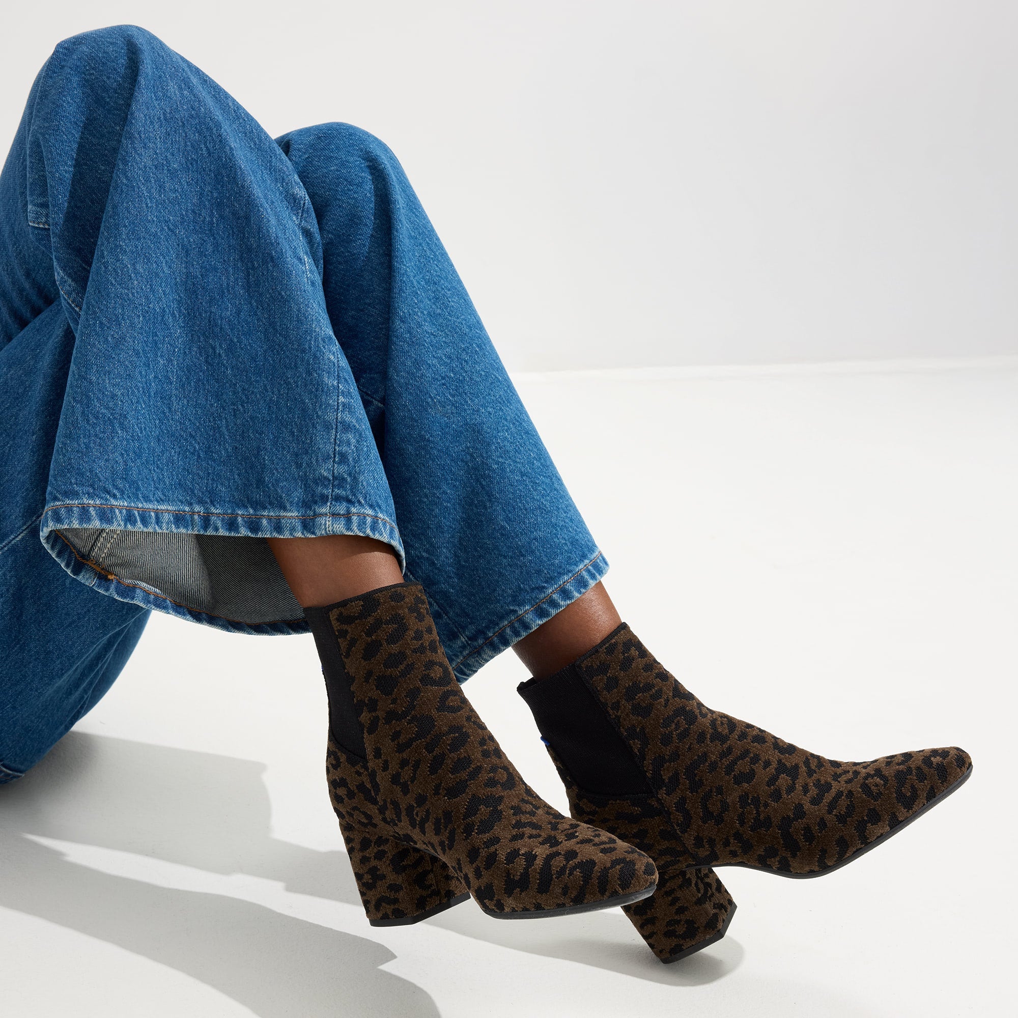 hover | Model wearing The High Classic Boot in ReVelvet™ Cheetah.