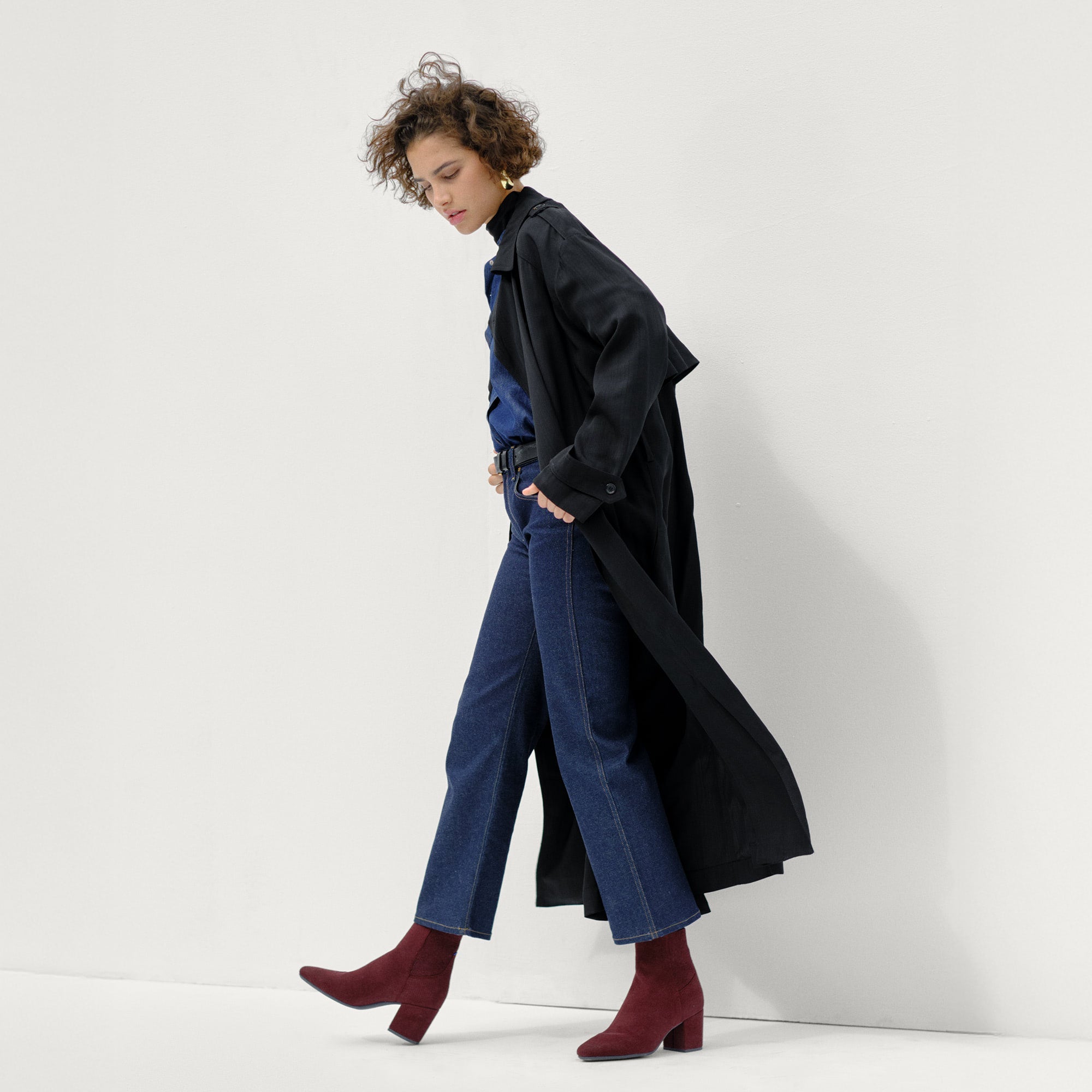 Alternate view of a model wearing The High Classic Boot in ReVelvet™ Syrah.