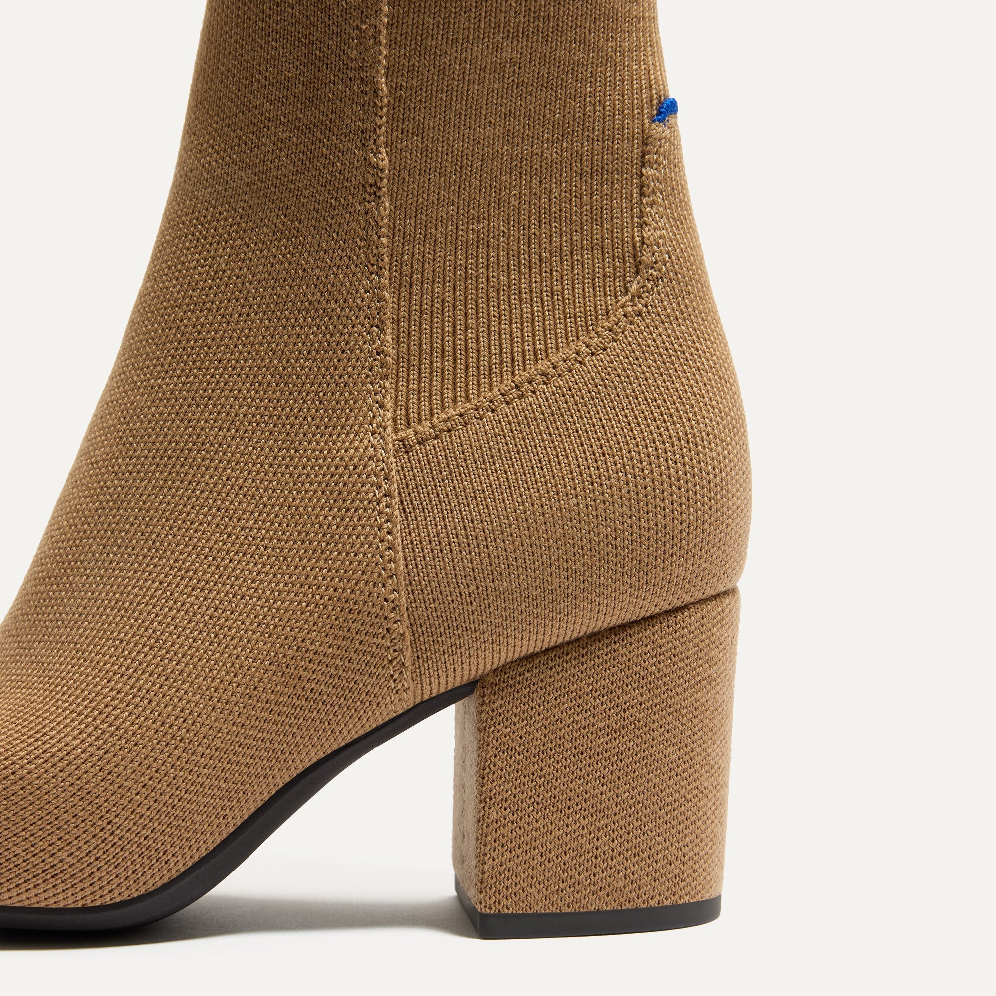 Close up of the block heel of The High Classic Boot in Tobacco.