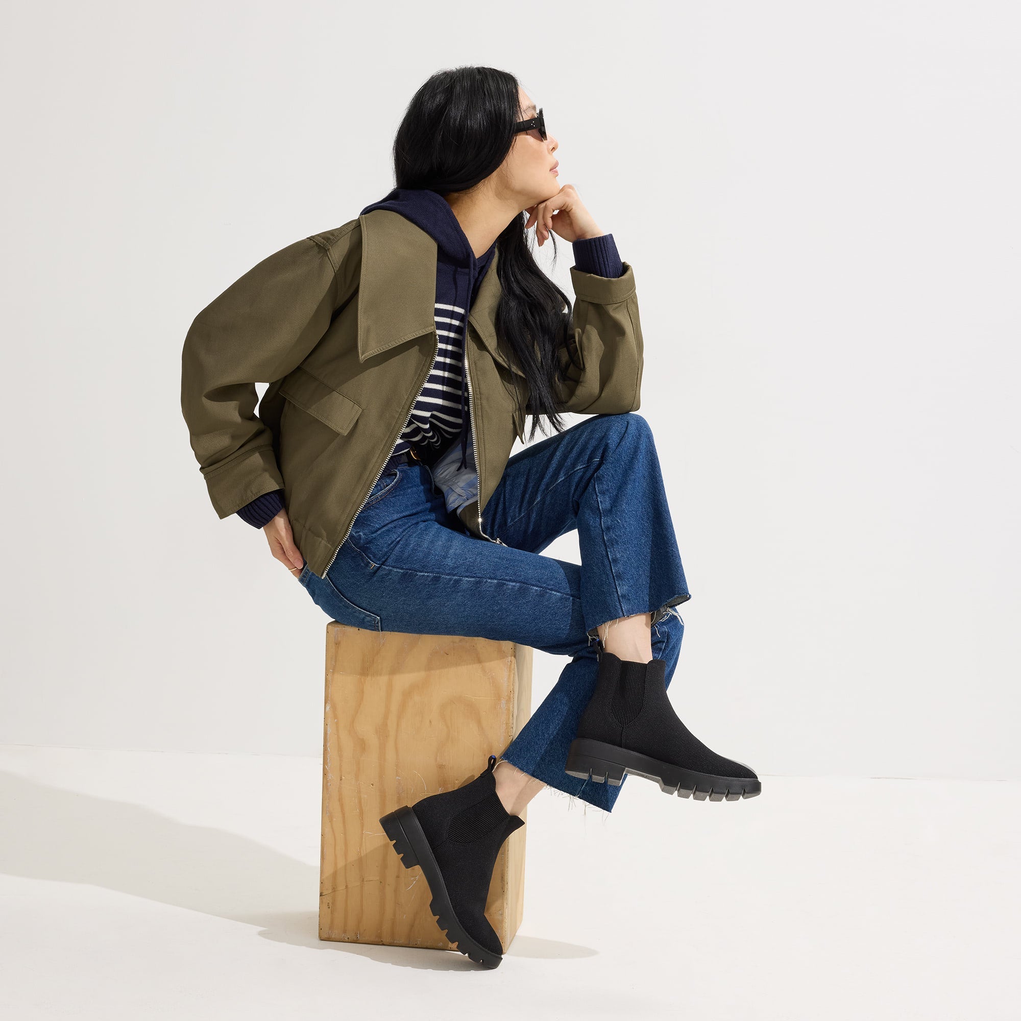 Alternate view of a model wearing The Puddle Skipper Boot in Black.