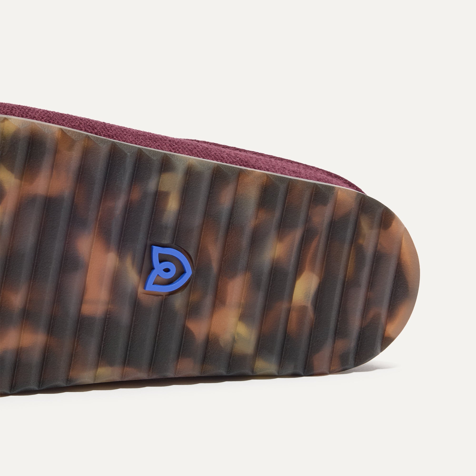 Close up of the outsoles of The Casual Clog in ReVelvet™ Syrah.