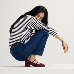 Alternate view of a model wearing The Double Buckle Mary Jane Heel in ReVelvet™ Syrah.